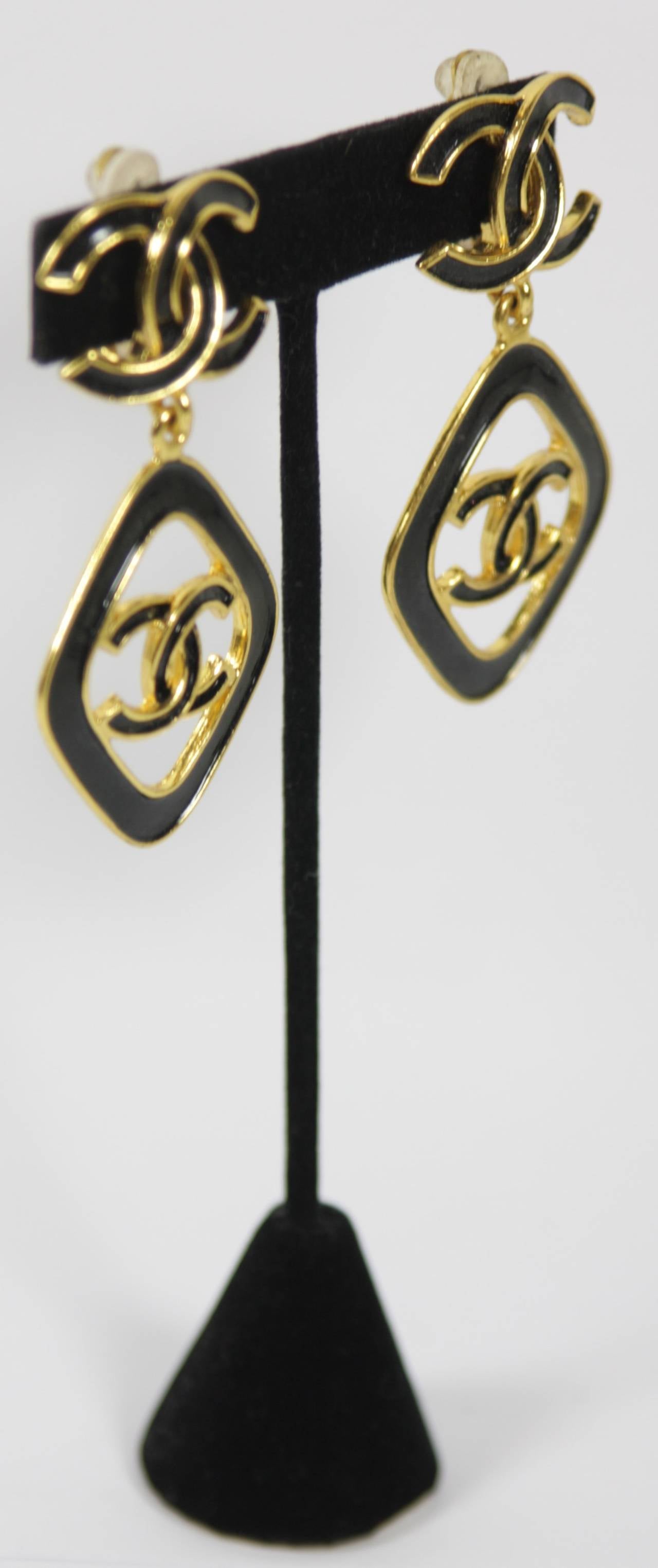 Chanel Gold Tone Logo Drop Earrings with Black Enamel Circa 1993 In Excellent Condition In Los Angeles, CA