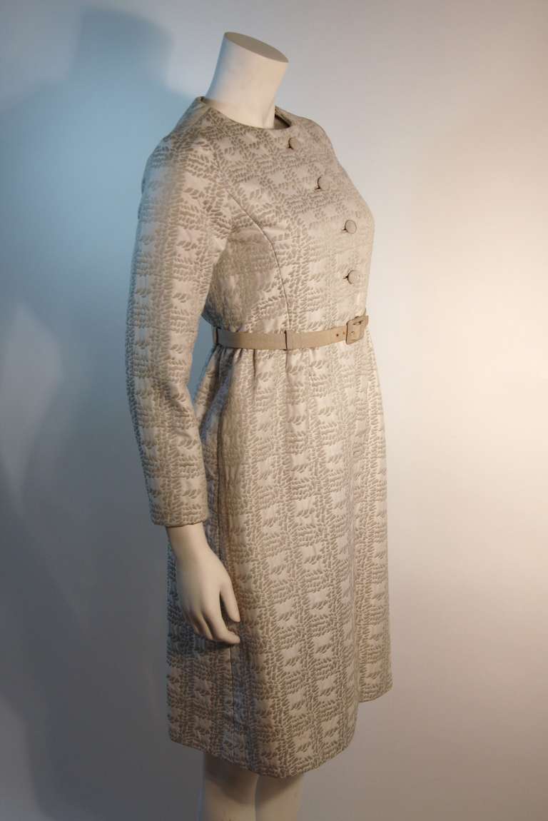 Christian Dior NEW YORK 1960's Silver and White Dress and Coat Ensemble

Measurements (Approximate):
Coat:
Length (back of neck to hem): 39.5