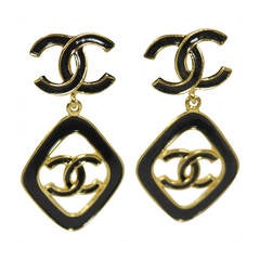 Chanel Gold Tone Logo Drop Earrings with Black Enamel Circa 1993