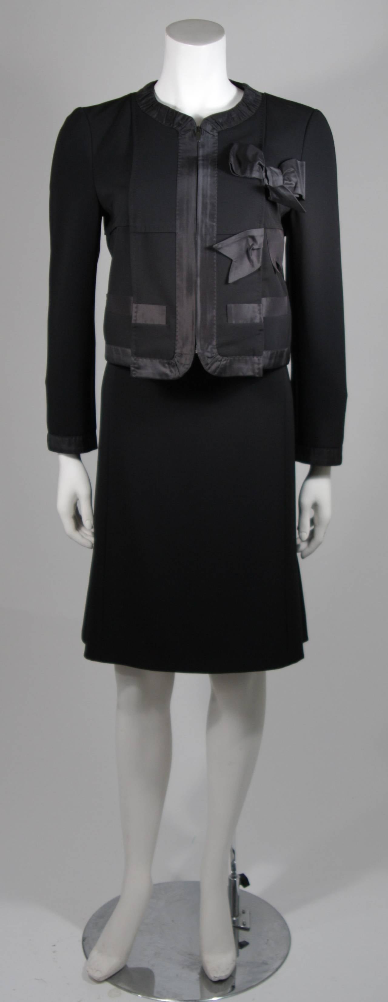 Moschino Black Skirt Suit with Silk Bow Detailing Size 12 In Excellent Condition For Sale In Los Angeles, CA