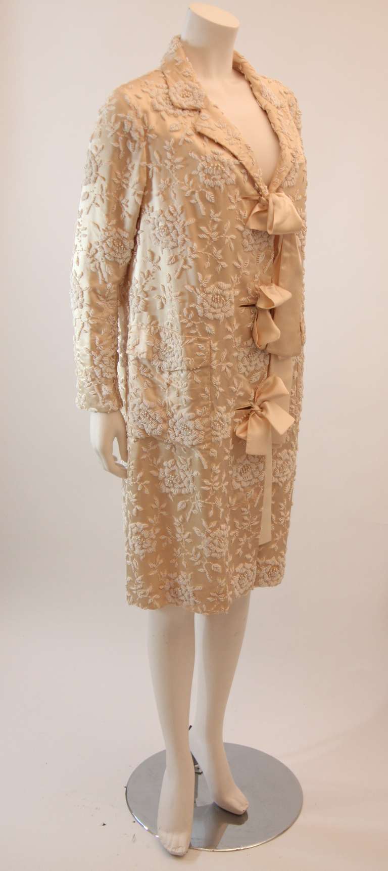 Beige Cream Silk Coat with white floral beaded motif and ribbon tie closures