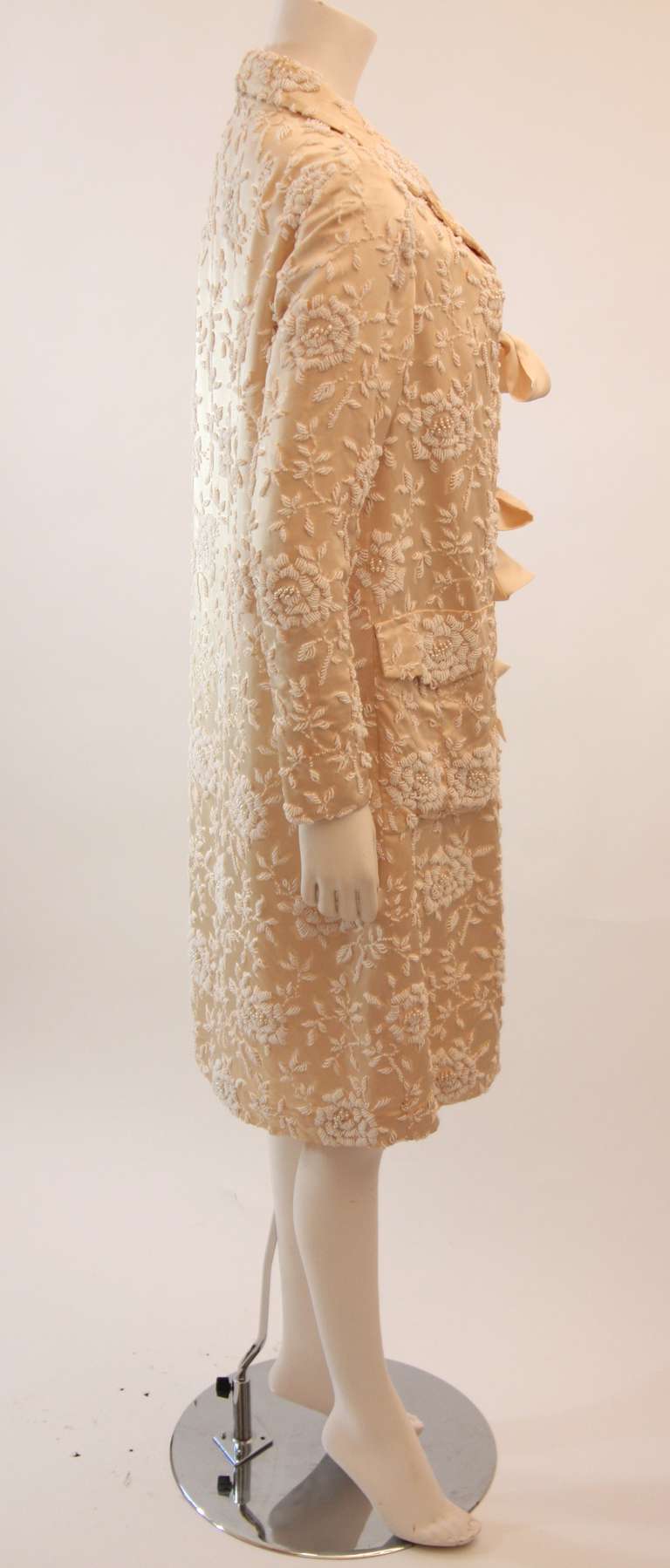 Cream Silk Coat with white floral beaded motif and ribbon tie closures In Excellent Condition In Los Angeles, CA