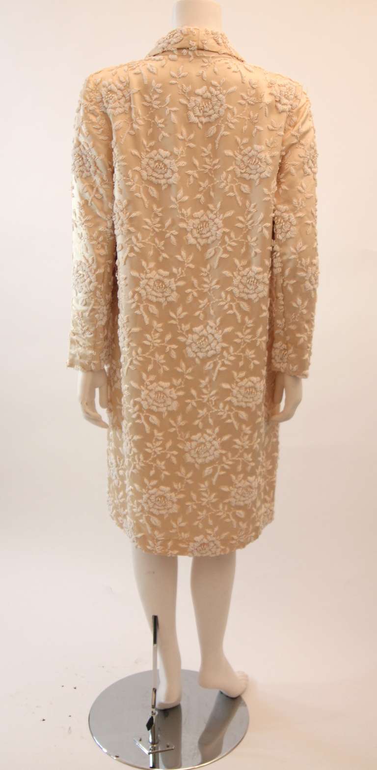 Cream Silk Coat with white floral beaded motif and ribbon tie closures 1