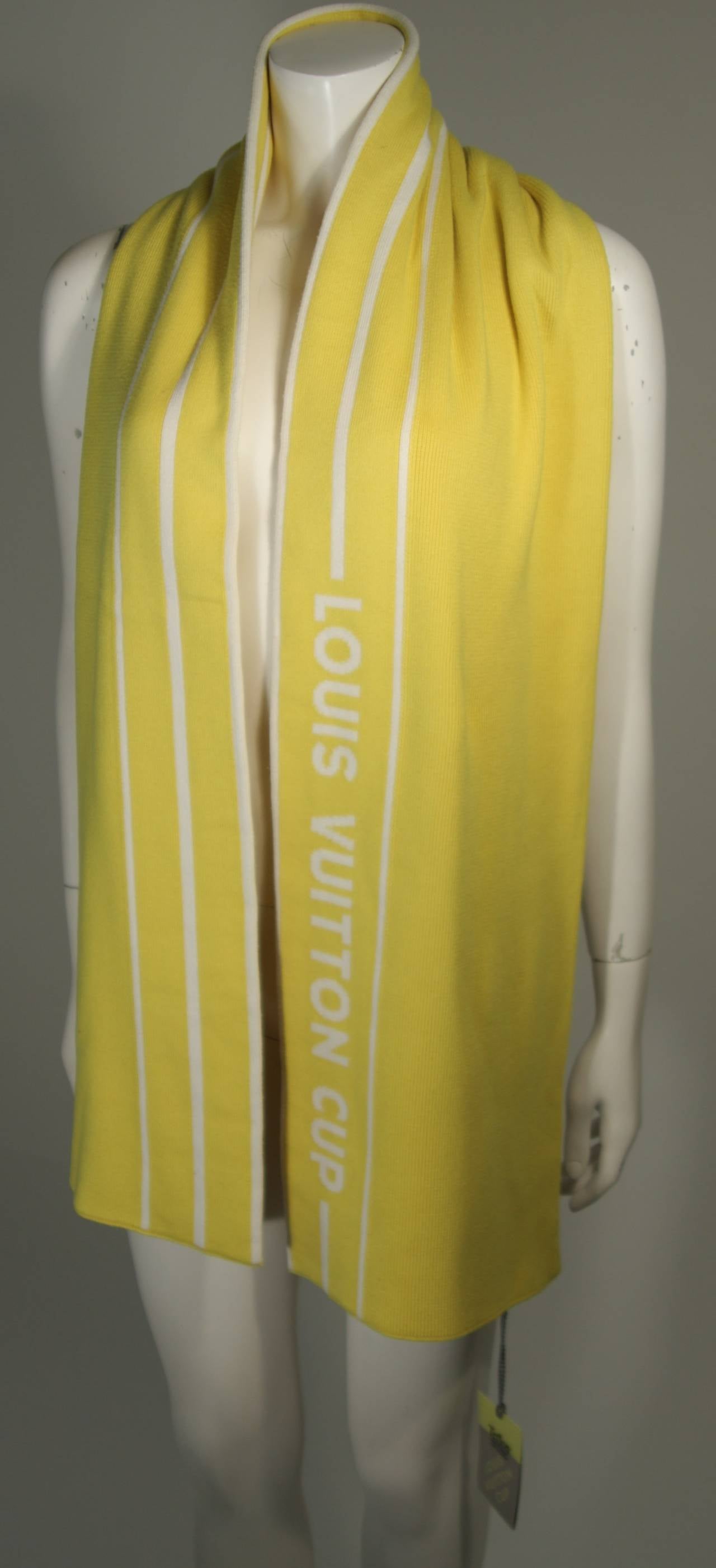 This Louis Vuitton cup scarf is composed of a thick yellow cashmere 15% and  85% cotton blend fabric. In excellent condition, comes with original tags. Made in Italy. 

**The size in the description box is an estimation; please cross-reference