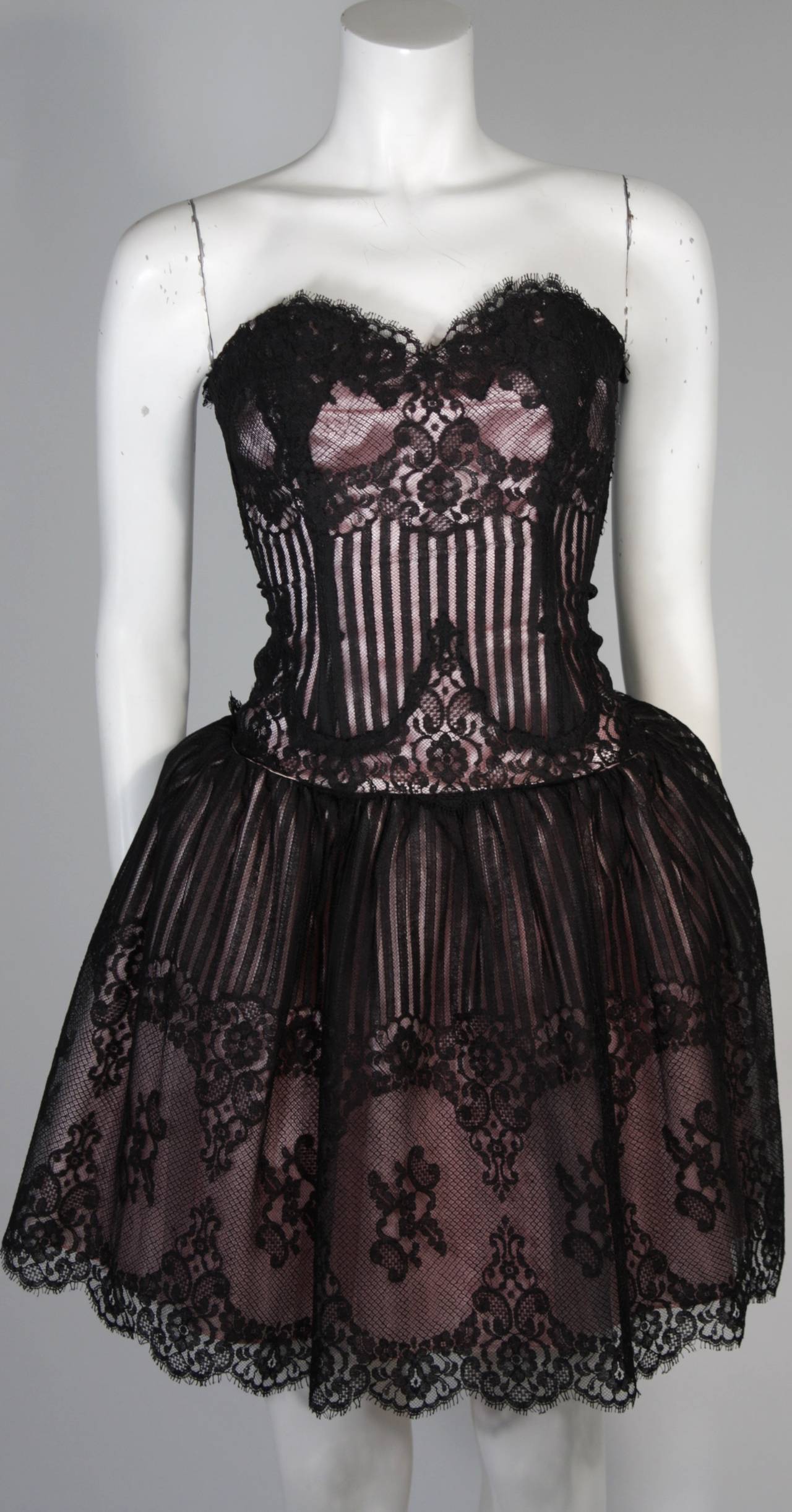 black lace dress with pink underlay