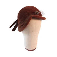 Jacques Fath Fur felt cloche with circular stitched design and bow detail