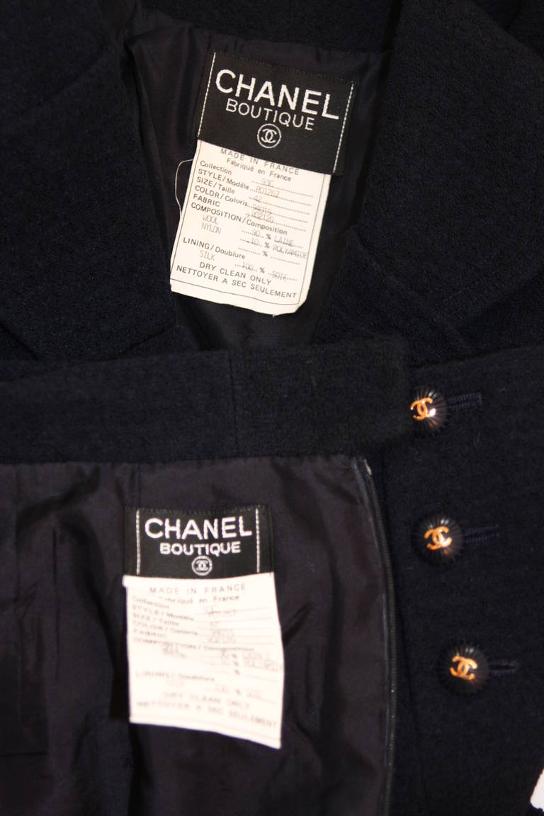 1993 C Chanel Navy Boucle Jacket and skirt suit with CC logo buttons 6