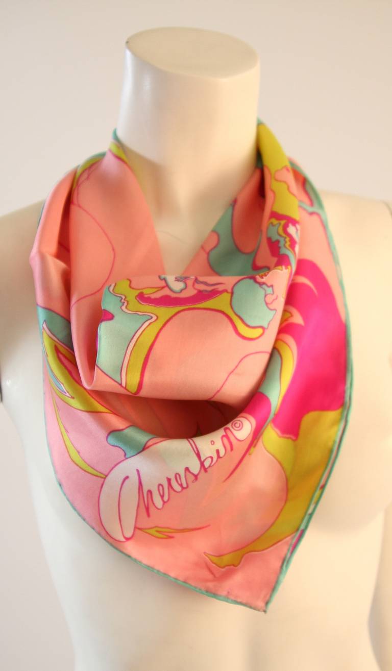 This is an absolutely fabulous scarf. It is designed by Chereskin. Made in Japan by Sally Gee. This scarf has a spectacular range and blend of colors featuring aqua, pink, magenta, and lime. This scarf is divine. 

Measures