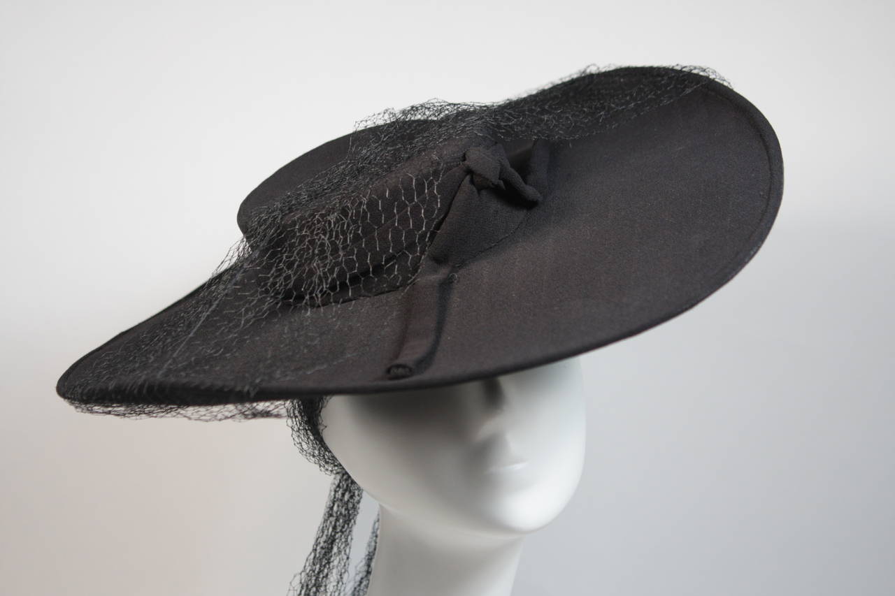 Yvonne California Black Pin Stripe Hat with Bow and Mesh Detail In Excellent Condition For Sale In Los Angeles, CA