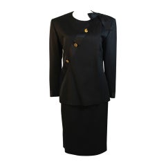1990s Chanel Black wool with Silk Ribbon Sash & Bow Jacket & Skirt Suit