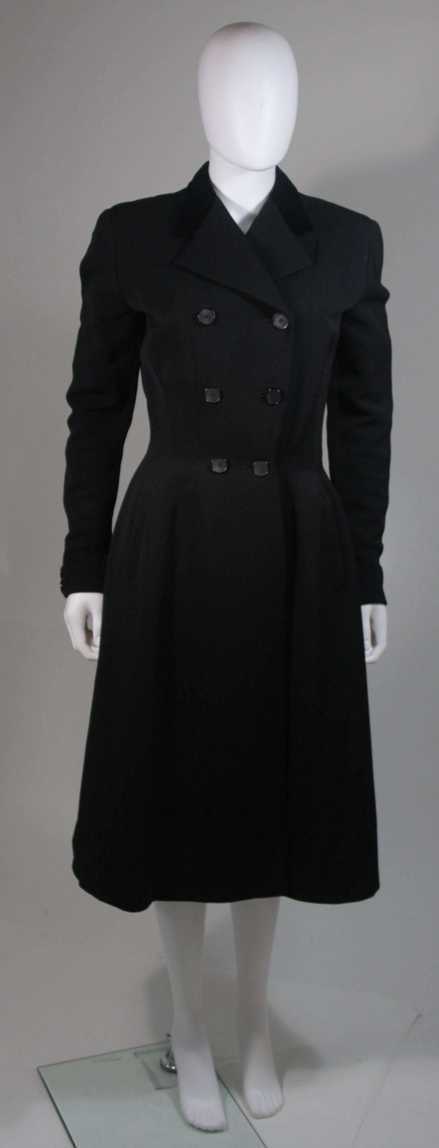 This coat is a rare piece representing the 'NEW LOOK' that originated in Paris by The House of Dior in  1947 shortly after WWII.
The 'NEW LOOK'  or 'Wasp Waist' was followed shortly thereafter  by all important fashion houses in Europe and the USA.