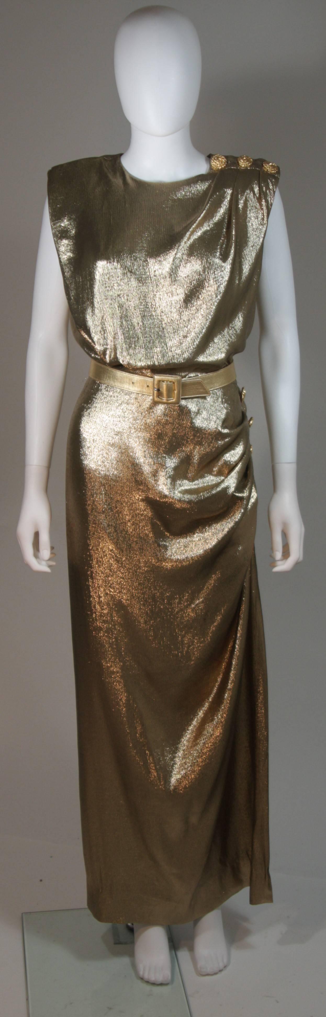 This Yves Saint Laurent design is available for viewing at our Beverly Hills Boutique. We offer a large selection of evening gowns and luxury garments. 

 This gown is composed of a radiant gold silk lame. The gown features a draped style with