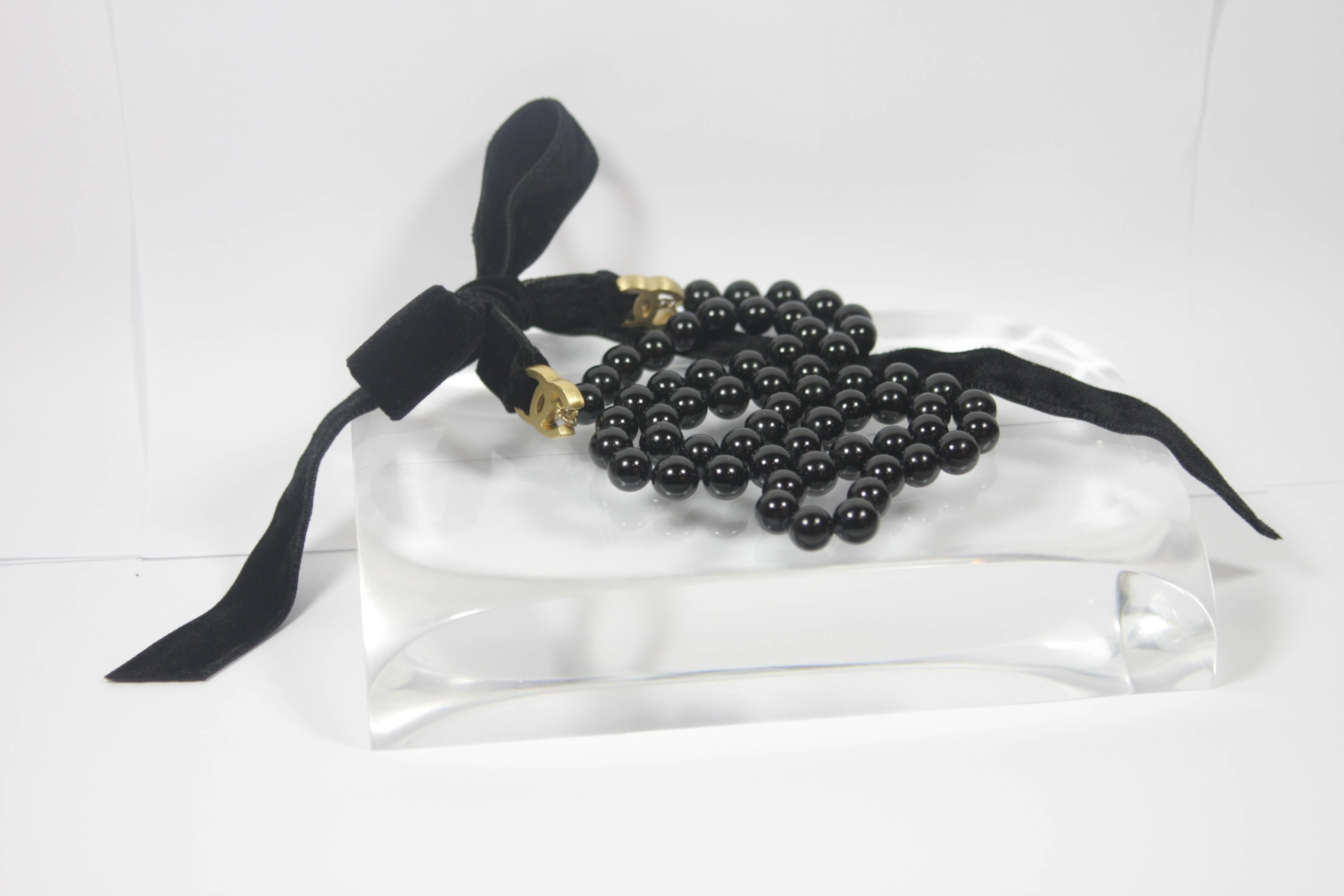 CHANEL Black Bead Necklace or Belt with Velvet Ties and Gold Tone Hardware In New Condition In Los Angeles, CA