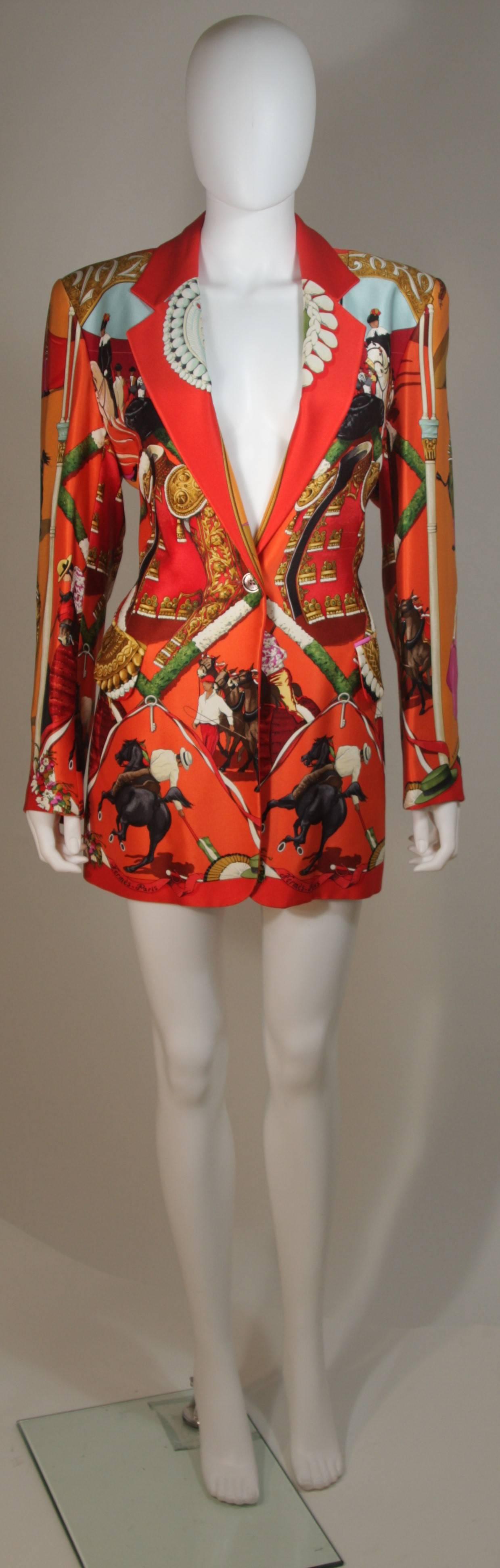 This Hermes design is available for viewing at our Beverly Hills Boutique. We offer a large selection of evening gowns and luxury garments. 

 This jacket is composed of an ultra fine printed silk. Features the 