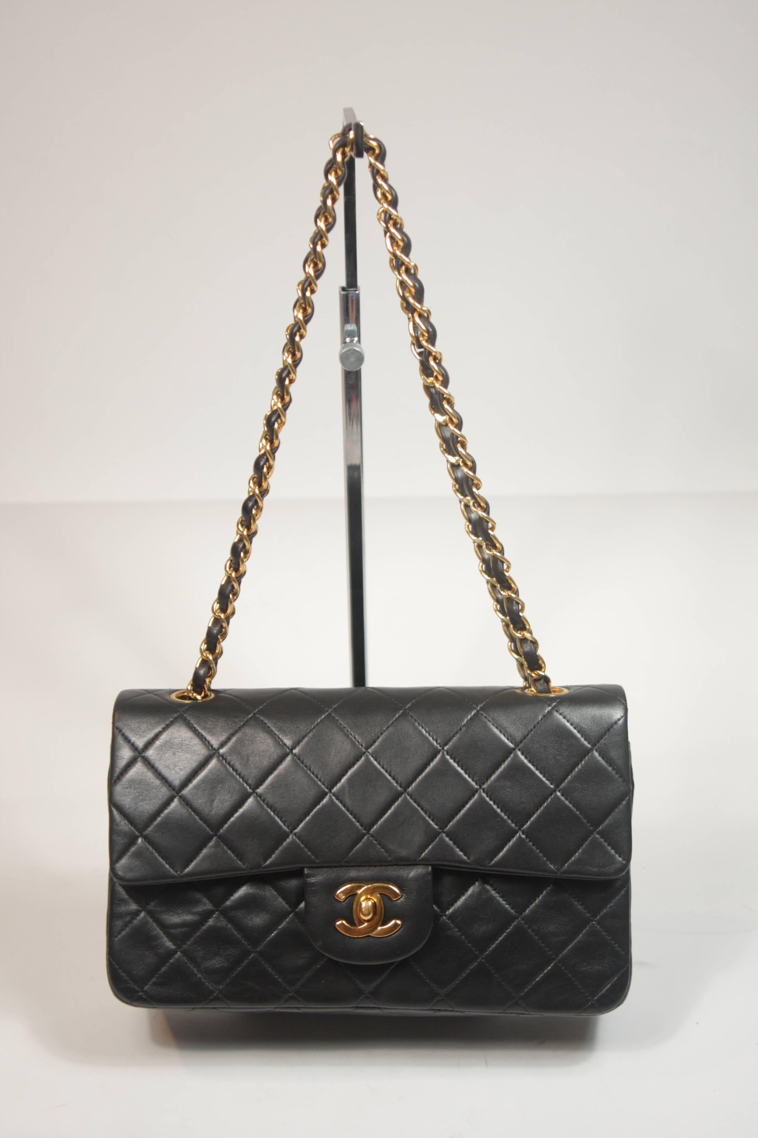 This Chanel design is available for viewing at our Beverly Hills Boutique. We offer a large selection of evening gowns and luxury garments. 

 This handbag is composed of a black quilted lambskin leather with Chanel's signature diamond quilting