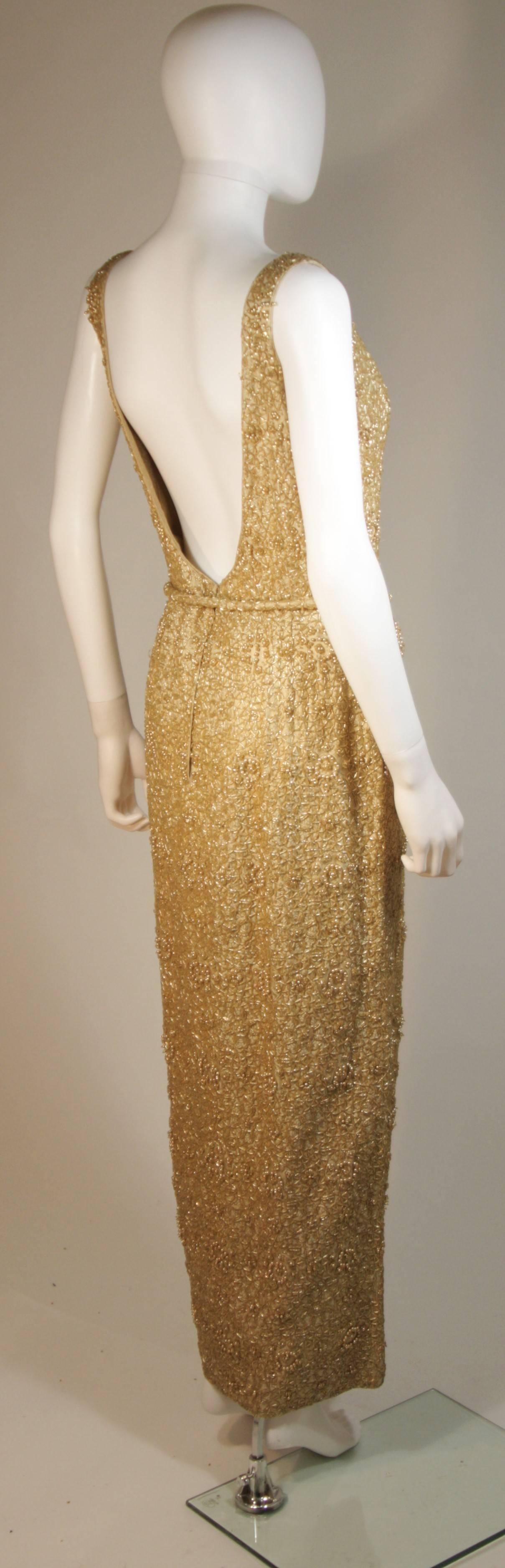 HAUTE COUTURE INT'L Gold Heavily Beaded Gown with Belt Size Large  In Excellent Condition For Sale In Los Angeles, CA