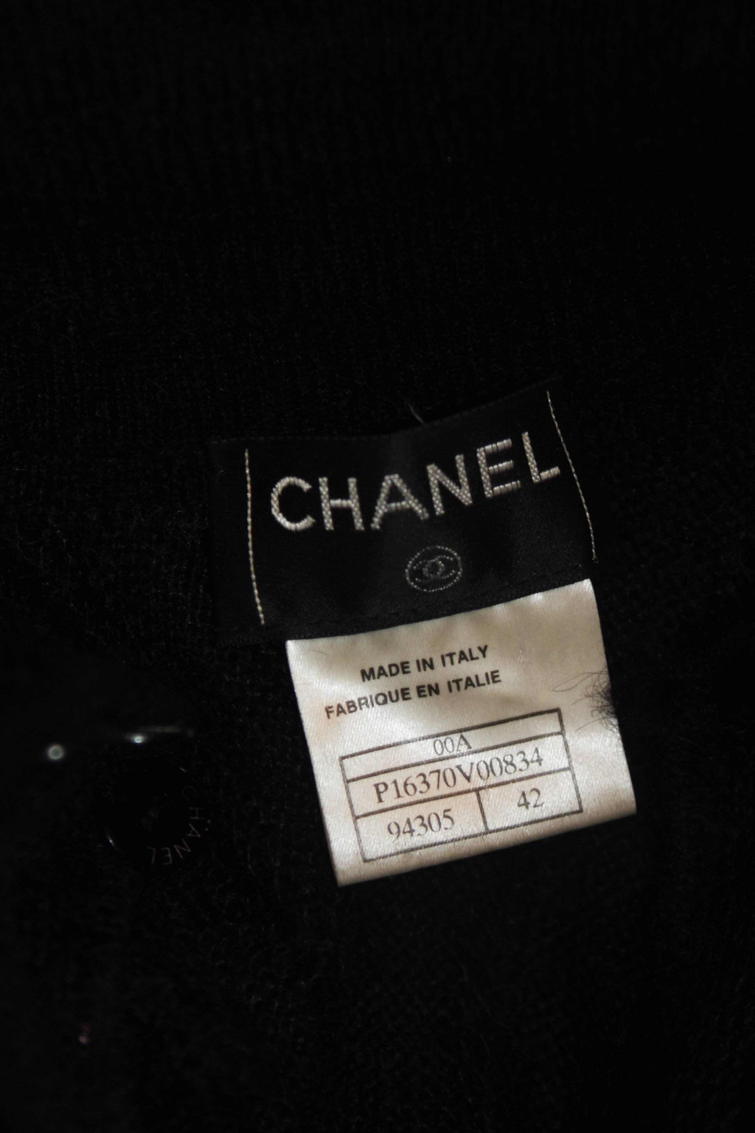 CHANEL Schwarzer ärmelloser Rollkragenpullover aus Mohair-Mischung mit Rüschen Größe 42 im Angebot 6