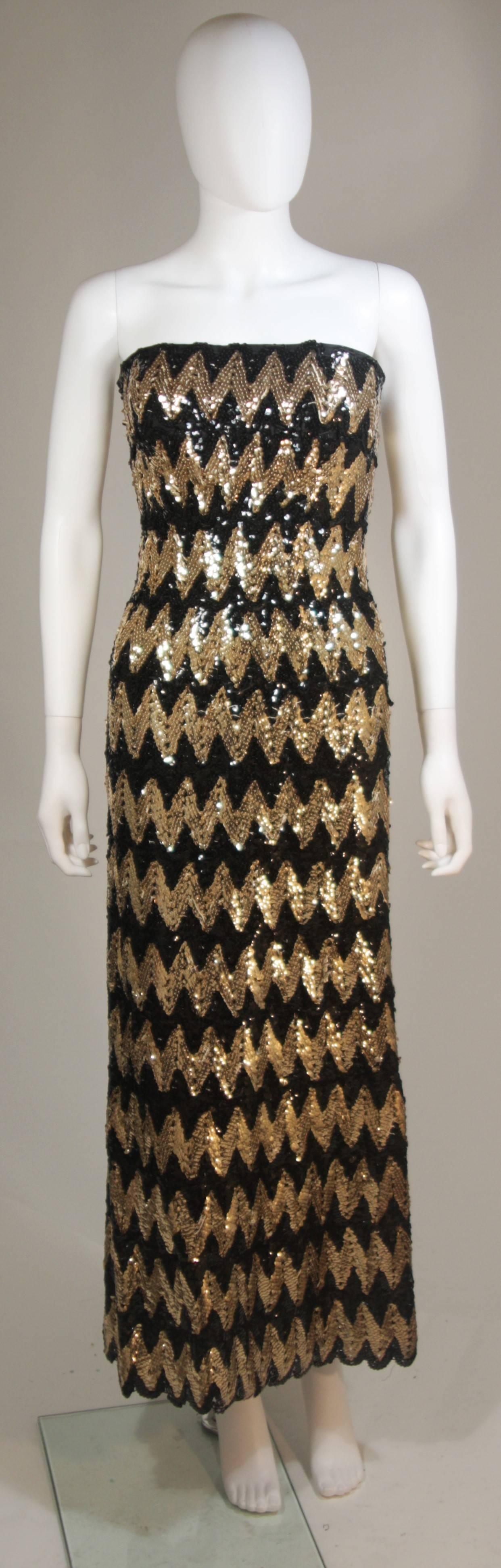  This Scaasi gown is composed of a sequined knit in black and gold hues with a zig zag pattern. There is a center back zipper and bustier foundation. In excellent great vintage condition. 

  **Please cross-reference measurements for personal