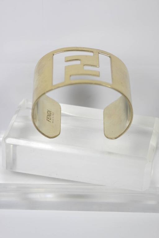 FENDI Gold Tone Logo Cuff at 1stDibs | fendi cuff bracelet, fendi gold cuff  bracelet, fendi logo bracelet
