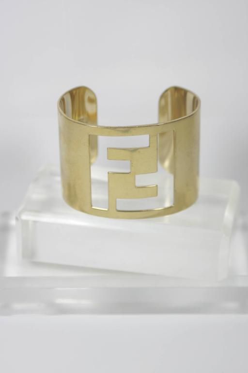 FENDI Gold Tone Logo Cuff at 1stDibs | fendi cuff bracelet, fendi gold cuff  bracelet, fendi bracelet cuff