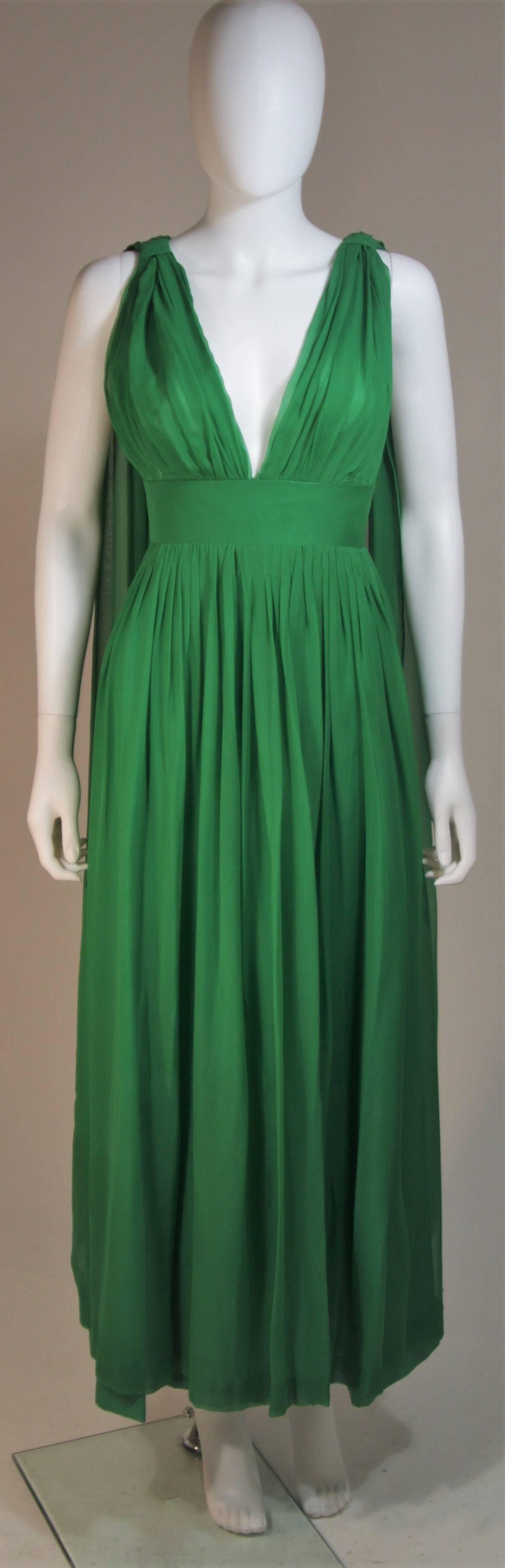 Erna Custom Couture gown 
Green silk chiffon 
Pleating and draping from shoulder 
Back zipper
Green lining 
