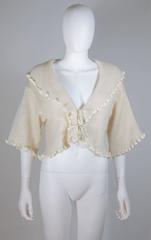 CHRISTIAN DIOR Cashmere Blend Tie Front Sweater with Ruffled Edges Size 6