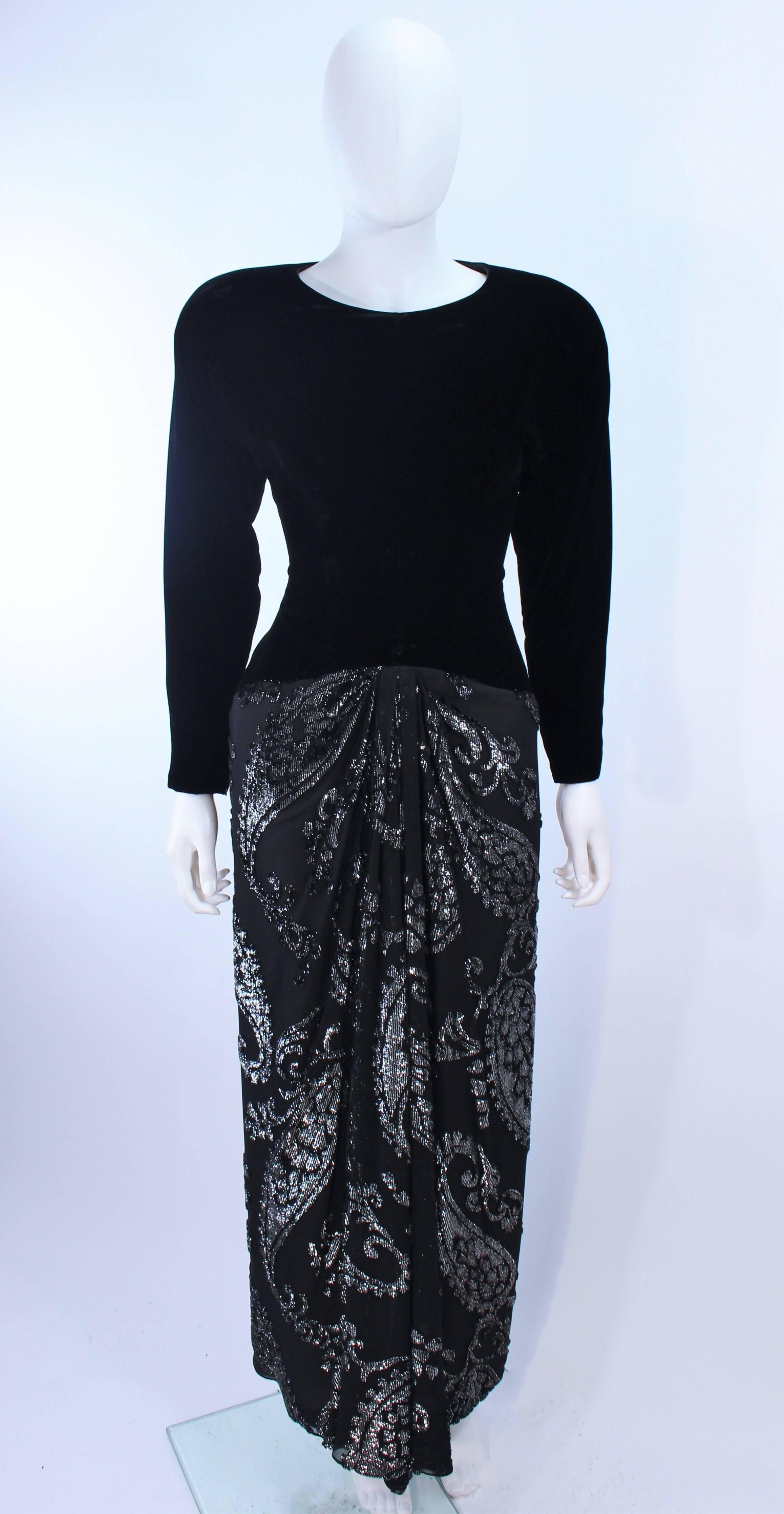 This Frank Tignino gown is composed of a velvet bodice with a draped silk lame skirt. There is a center back zipper closure. In excellent vintage condition. Beautiful design.

**Please cross-reference measurements for personal accuracy. Size in