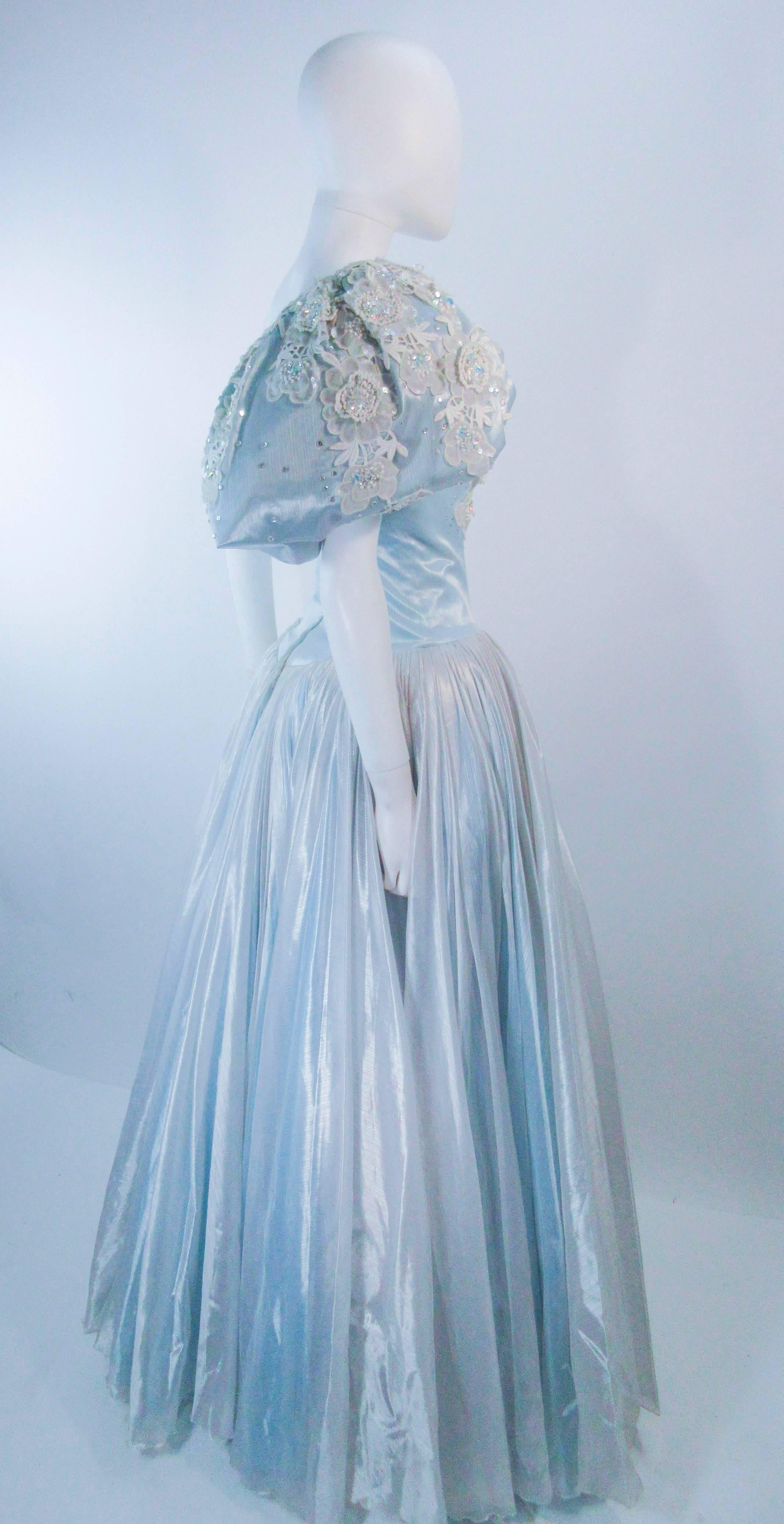 NOLAN MILLER Sky Blue Gown with One Shoulder and Floral Applique Size 2 4 In Excellent Condition In Los Angeles, CA