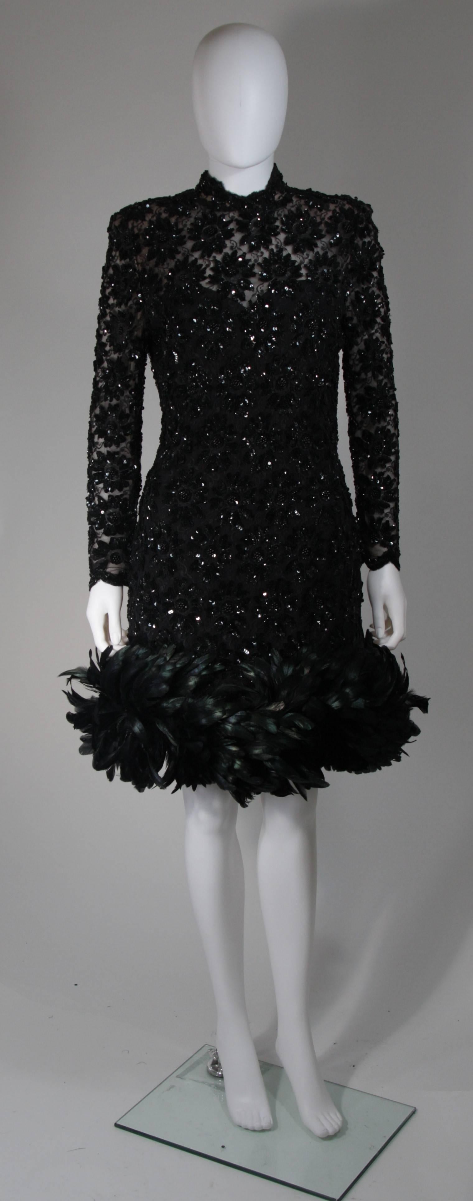 This Travilla cocktail dress is composed of an embellished lace, adorned with sequins and beading. There is a center back zipper. In excellent condition. Made in USA.

**Please cross-reference measurements for personal accuracy. The size listed in