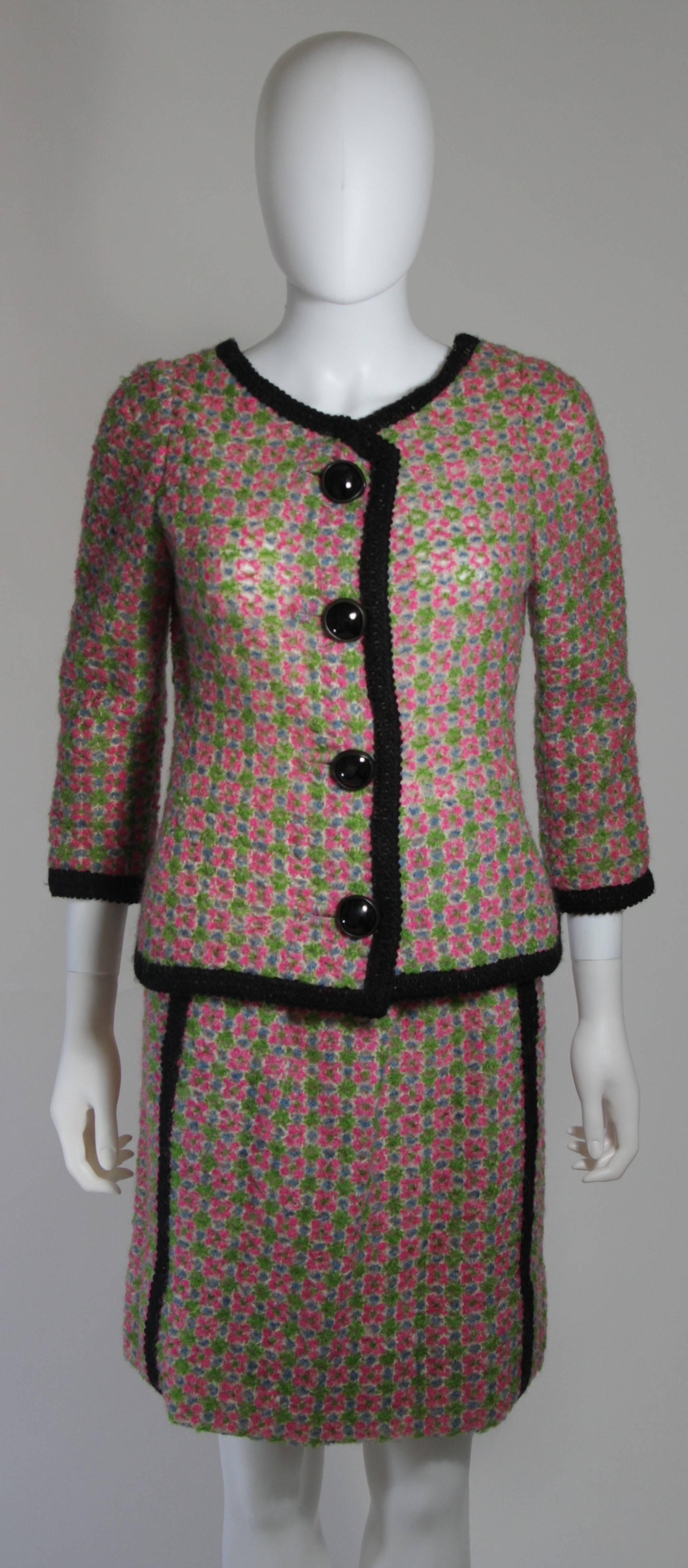pink and green skirt suit