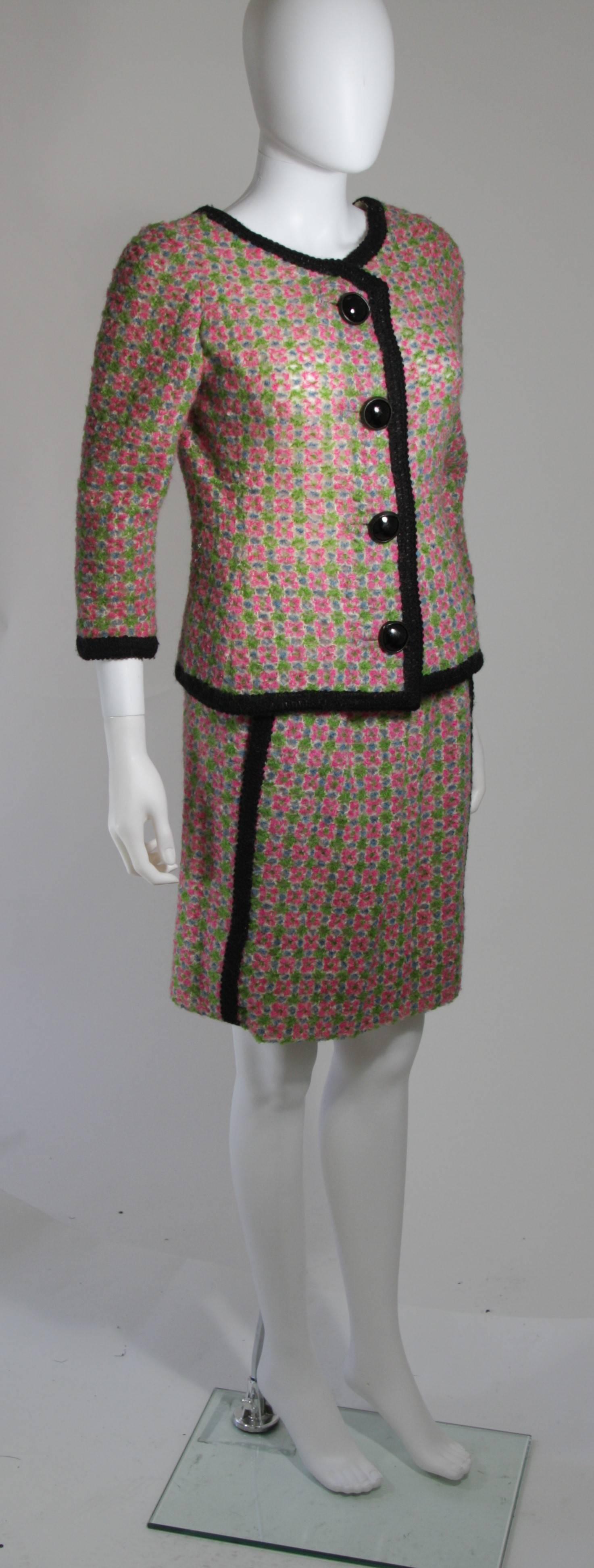 pink and green knit suit