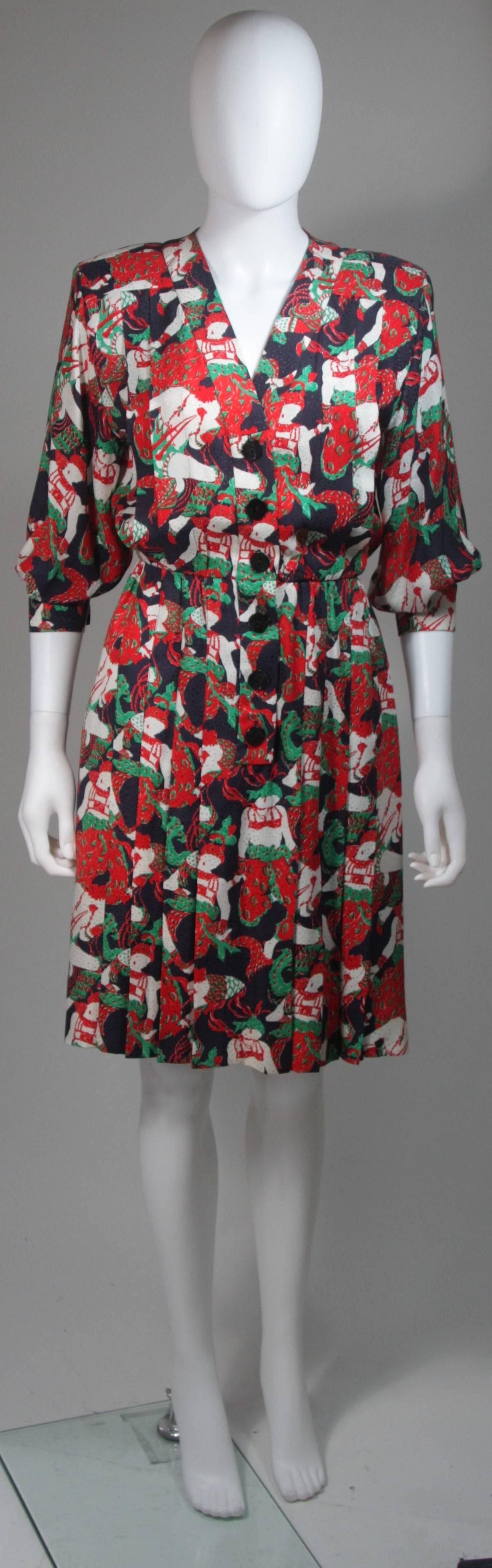 This Yves Saint Laurent dress is composed of a colorful printed silk. The dress features center front button closures and a pleated skirt. In excellent condition. Made in France. 

**Please cross-reference measurements for personal accuracy.