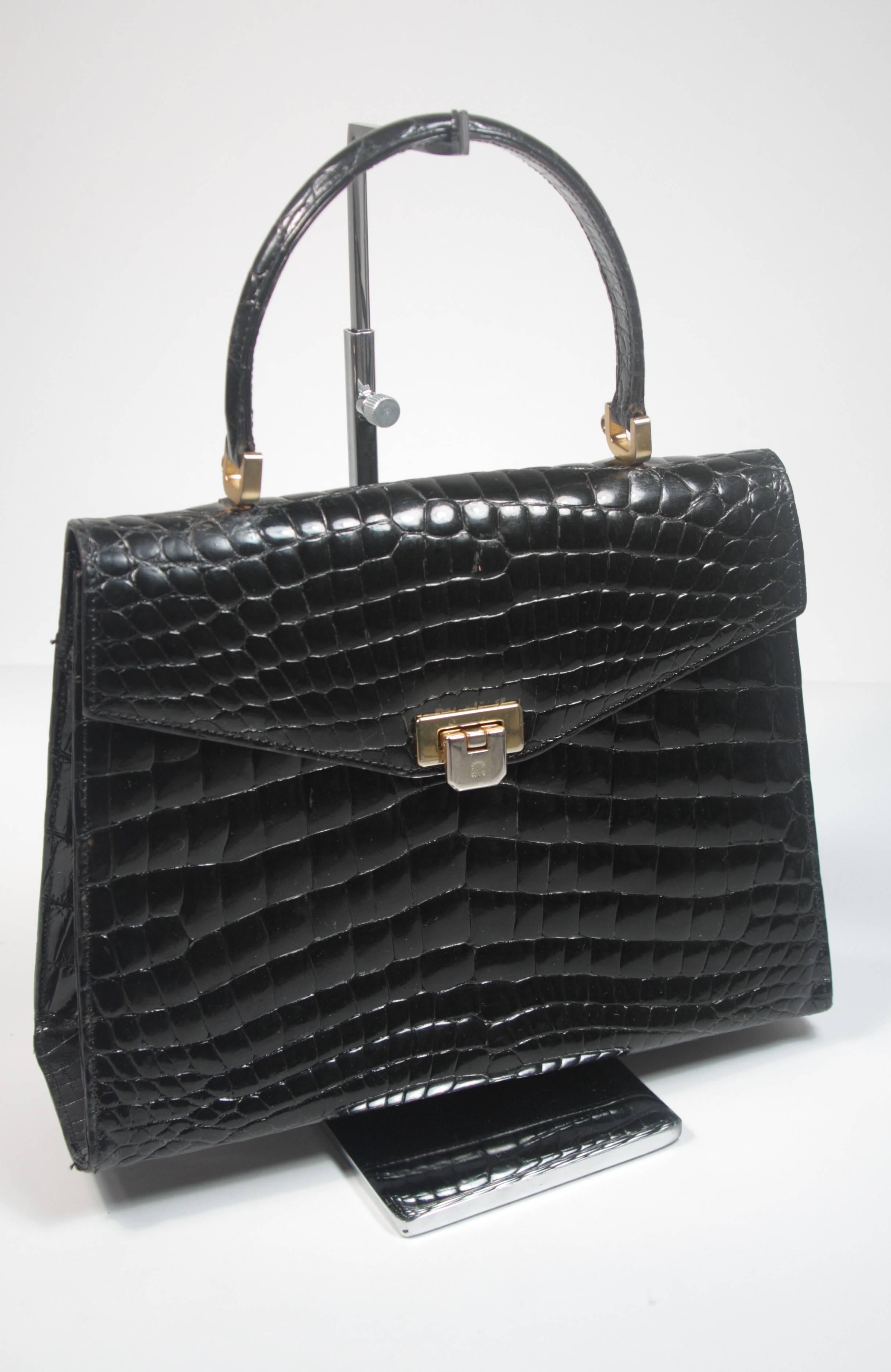 black crocodile purse