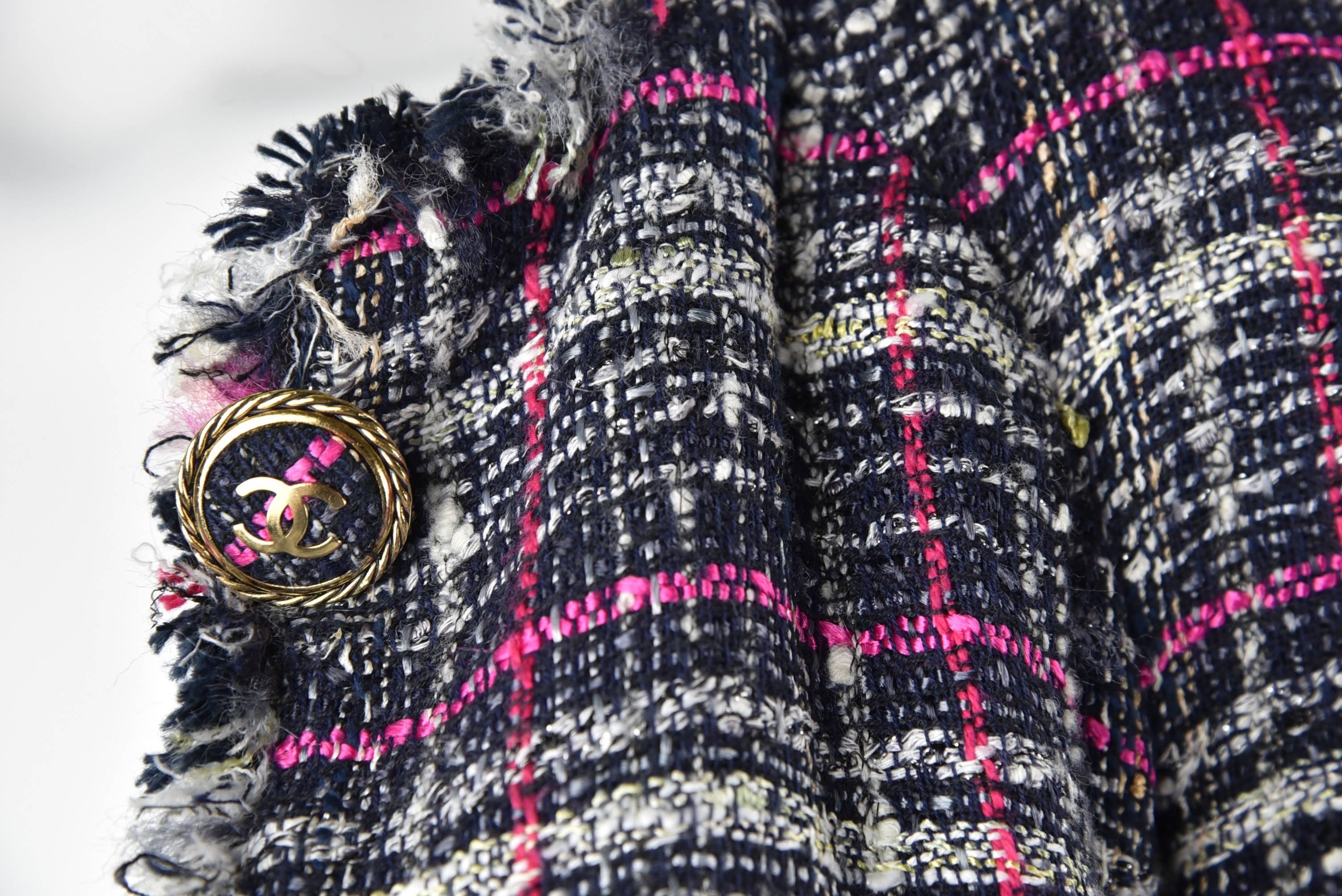 This 3/4 Coat is a wonderfully useful plaid Summer coat over skirts, dresses, pants or jeans.  The gorgeous fabric is woven of cotton, rayon, nylon, wool, linen and acrylic with silver metallic threads in the usual style of Chanel lush fabric