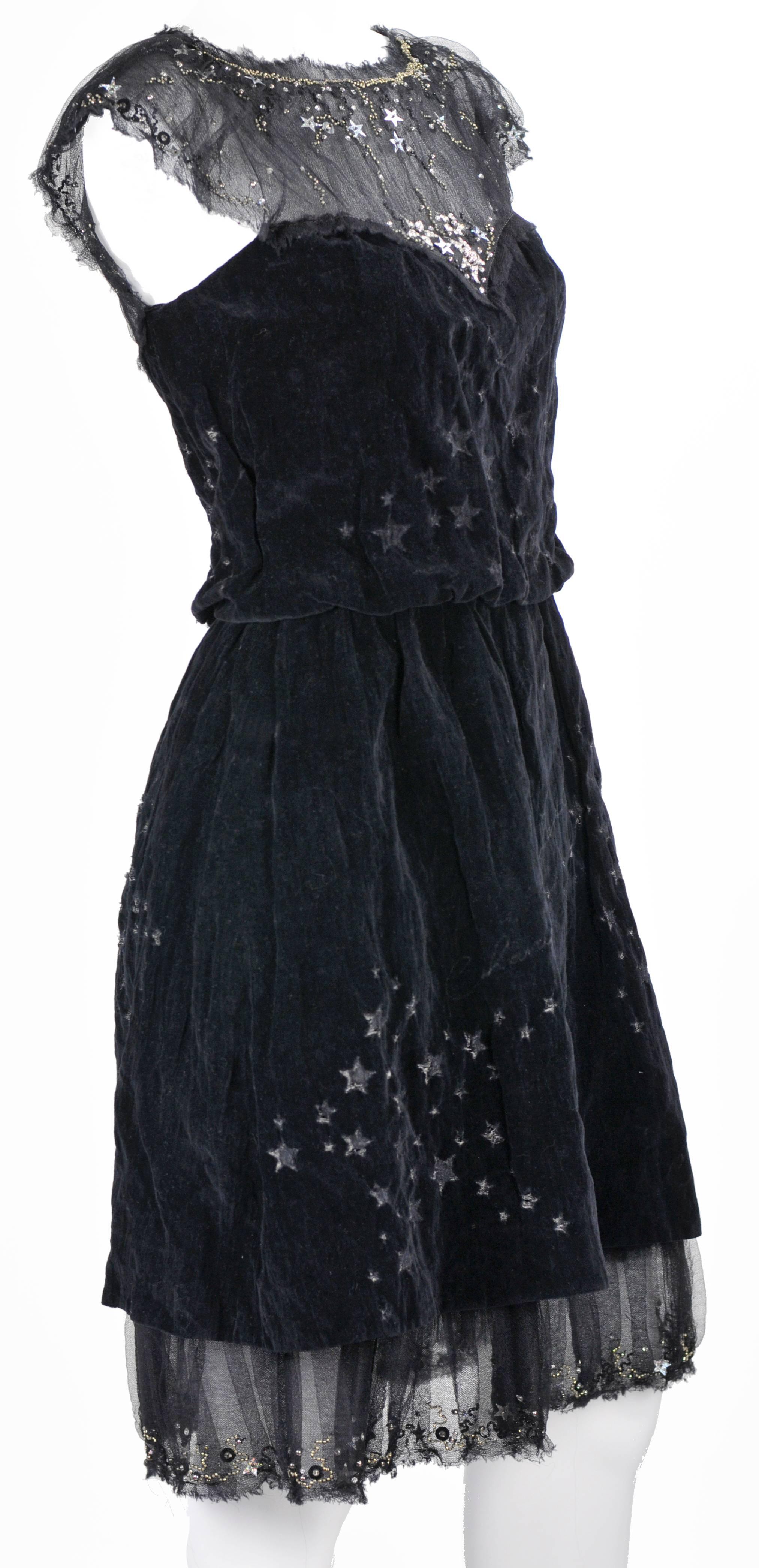 The elegance of this evening dress begins with magical silver stars and beads on the net bodice and net slip/ruffle at the bottom--simulating the night sky.  Hundreds of more softly shining stars are woven into the 85% cotton and 15% metallic black