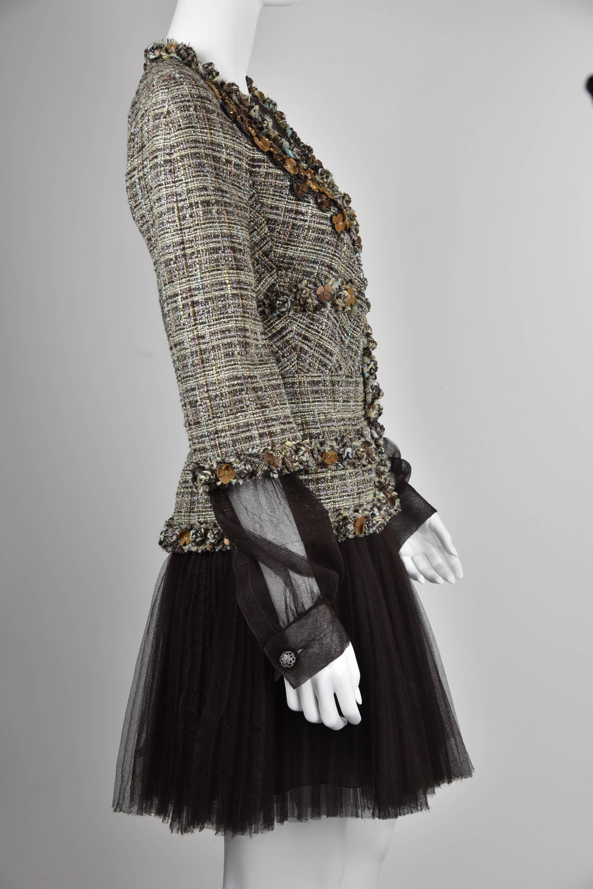 This jacket and dress ensemble is one of the most complex and beautiful Lesage designs Chanel has ever executed, as noticed during the visit of the NYC Fashion Institute of Technology when they viewed the collection.  It includes hundreds of