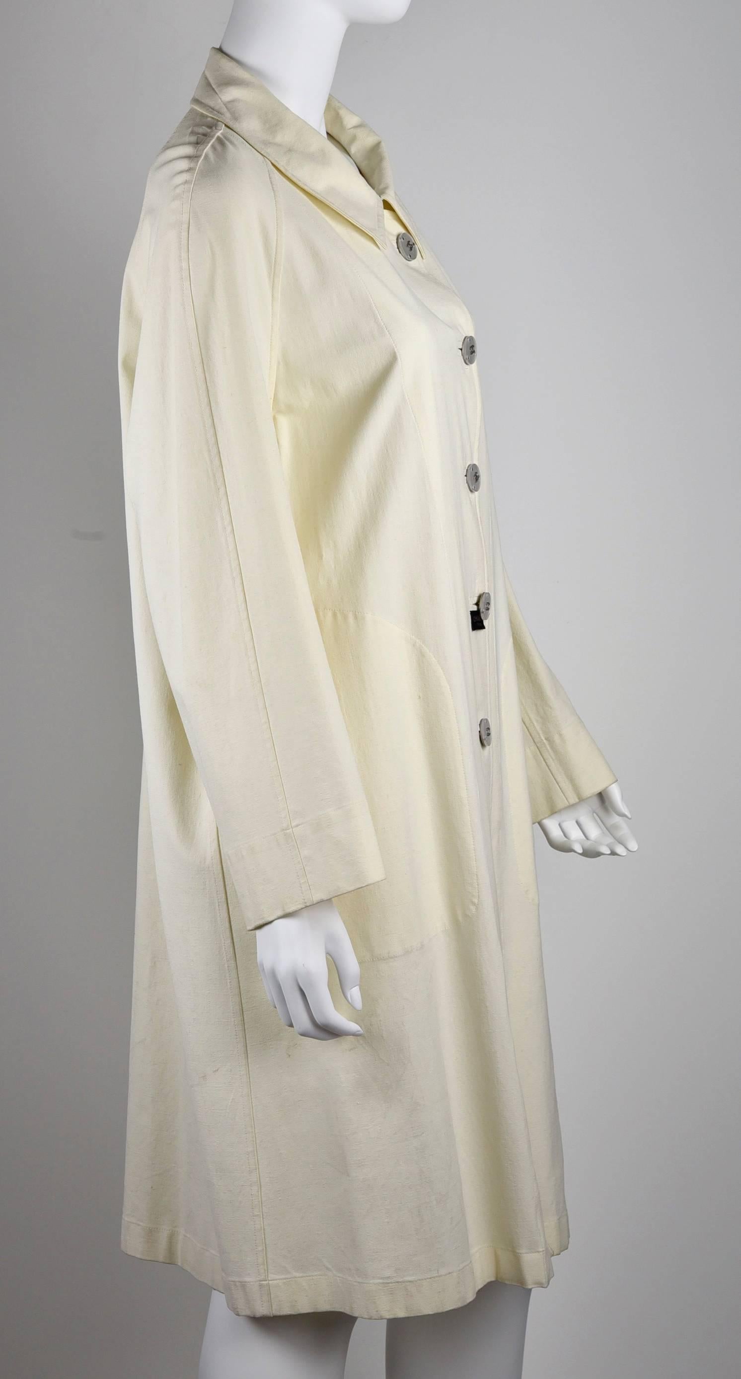 A summer raincoat with a waterproof inside.  Great lightweight coat for travel. Fabric is 66% rayon, 22% linen, 9% spandex 3% nylon. It has a nice linen texture look with stretch.
Chanel #P12838V07399