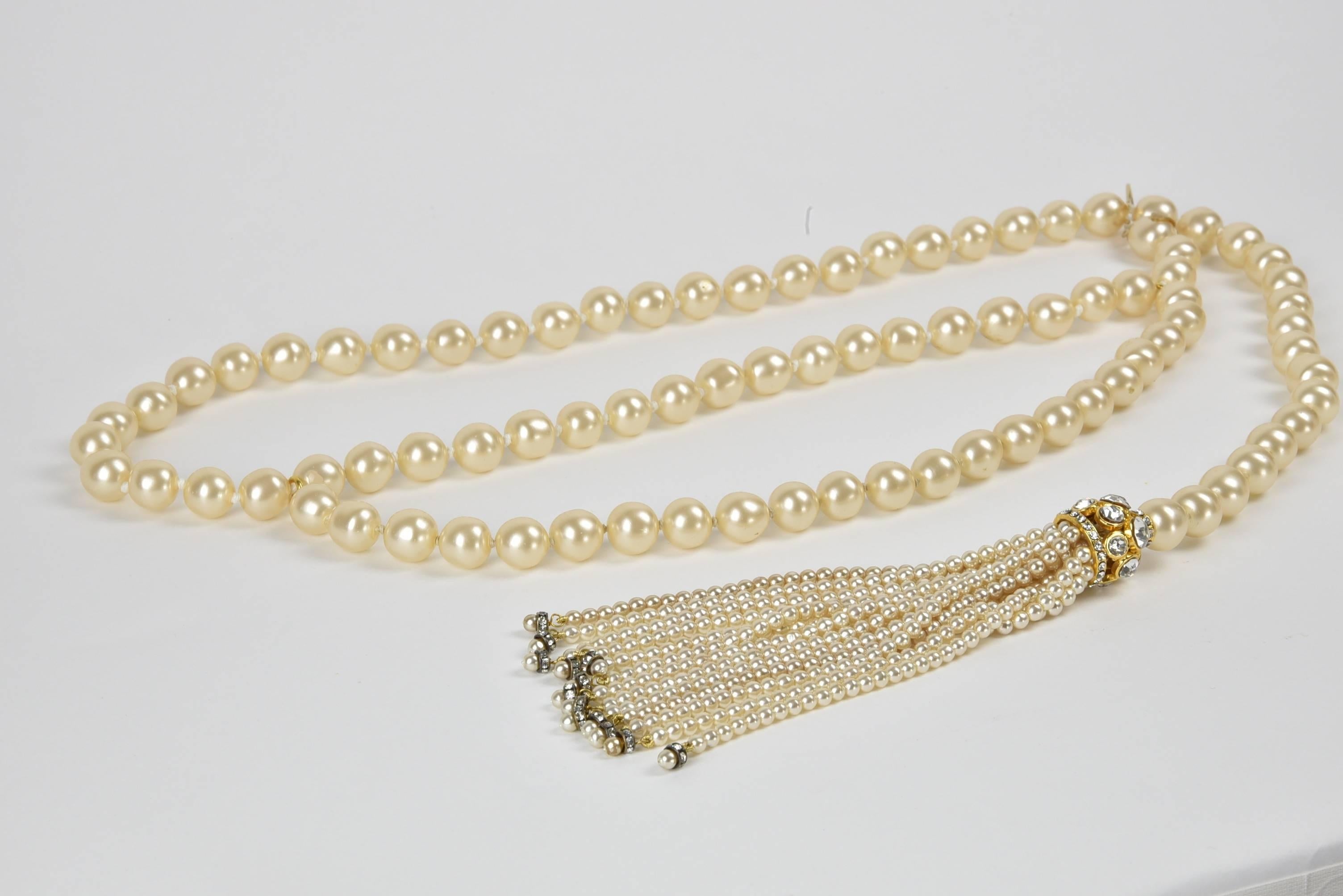 The most dramatic and beautiful tassels ever made by Chanel!
Spectacular  jeweled pearl and rhinestone tassel belt with matching earrings which brush shoulder top. Rare opportunity to have matching set
Total Troy ounce weight of belt and earrings