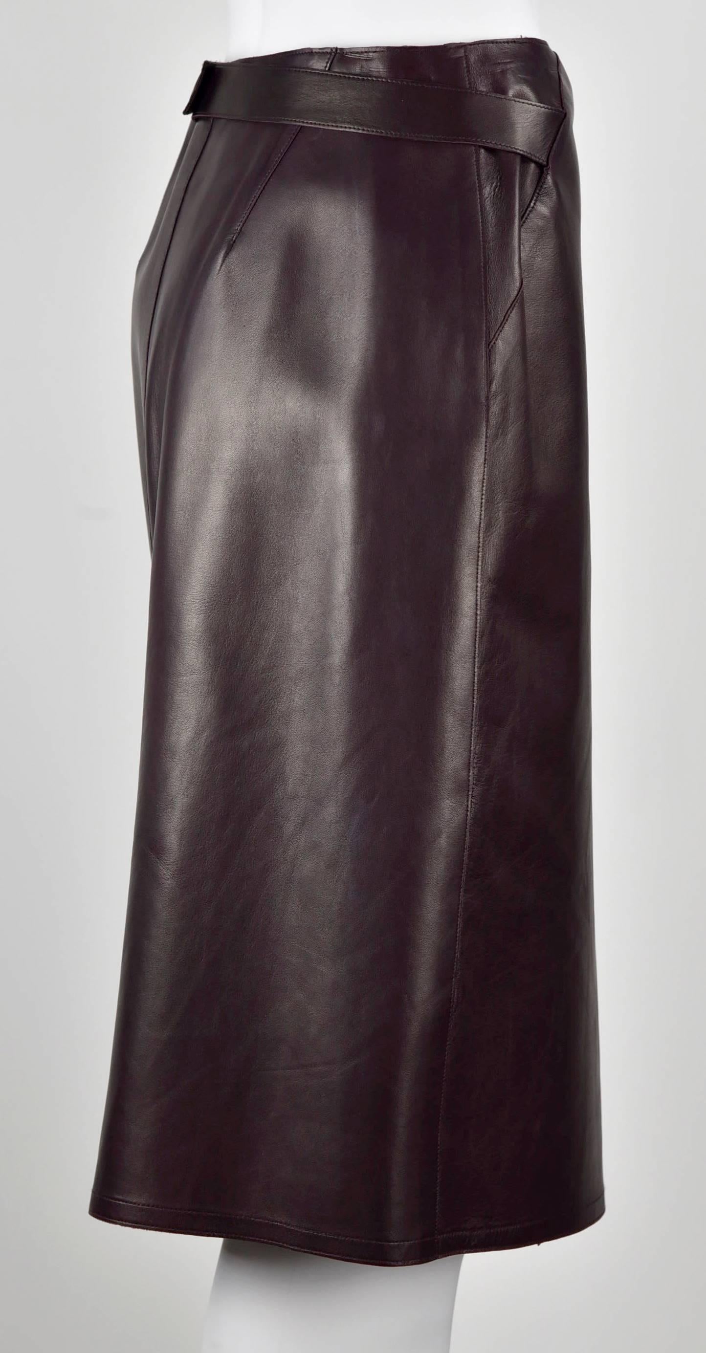   This skirt is a gorgeous aubergine color that works nicely with black jackets.  Measurements are:  Height 24", Waist 28", Hips 38" and wrapped Hem 42' A-line. 100% lambskin. A wrap skirt sometimes needs alteration adjustment to