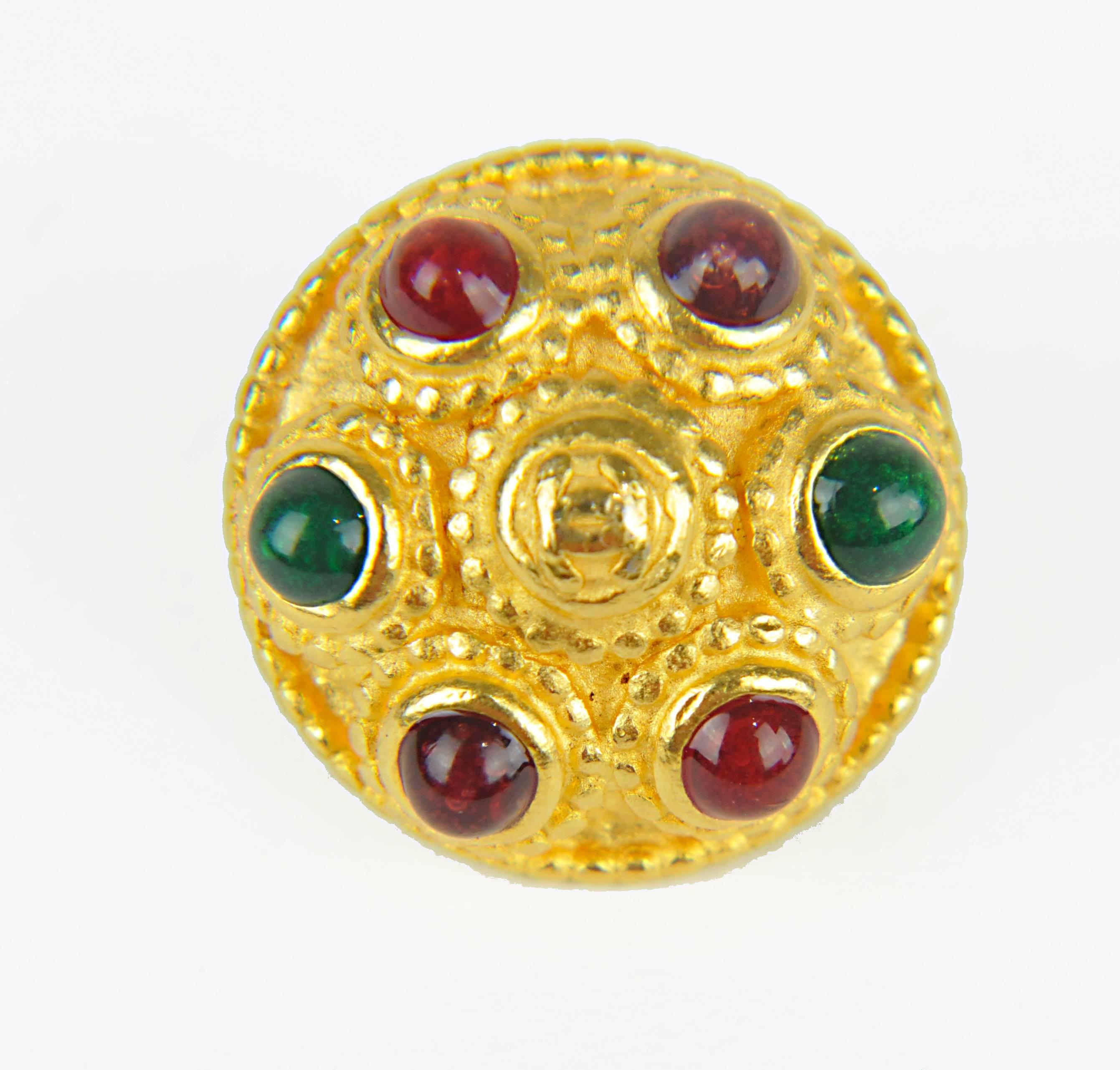 These buttons were designed by Madame Gripoix for the famous Chanel Military Collection of fall 1996. There are 6 buttons 3/4" in diameter and 2 buttons 5/8" in diameter.  Perfect for a suit jacket and cuffs. The design is gilt metal with