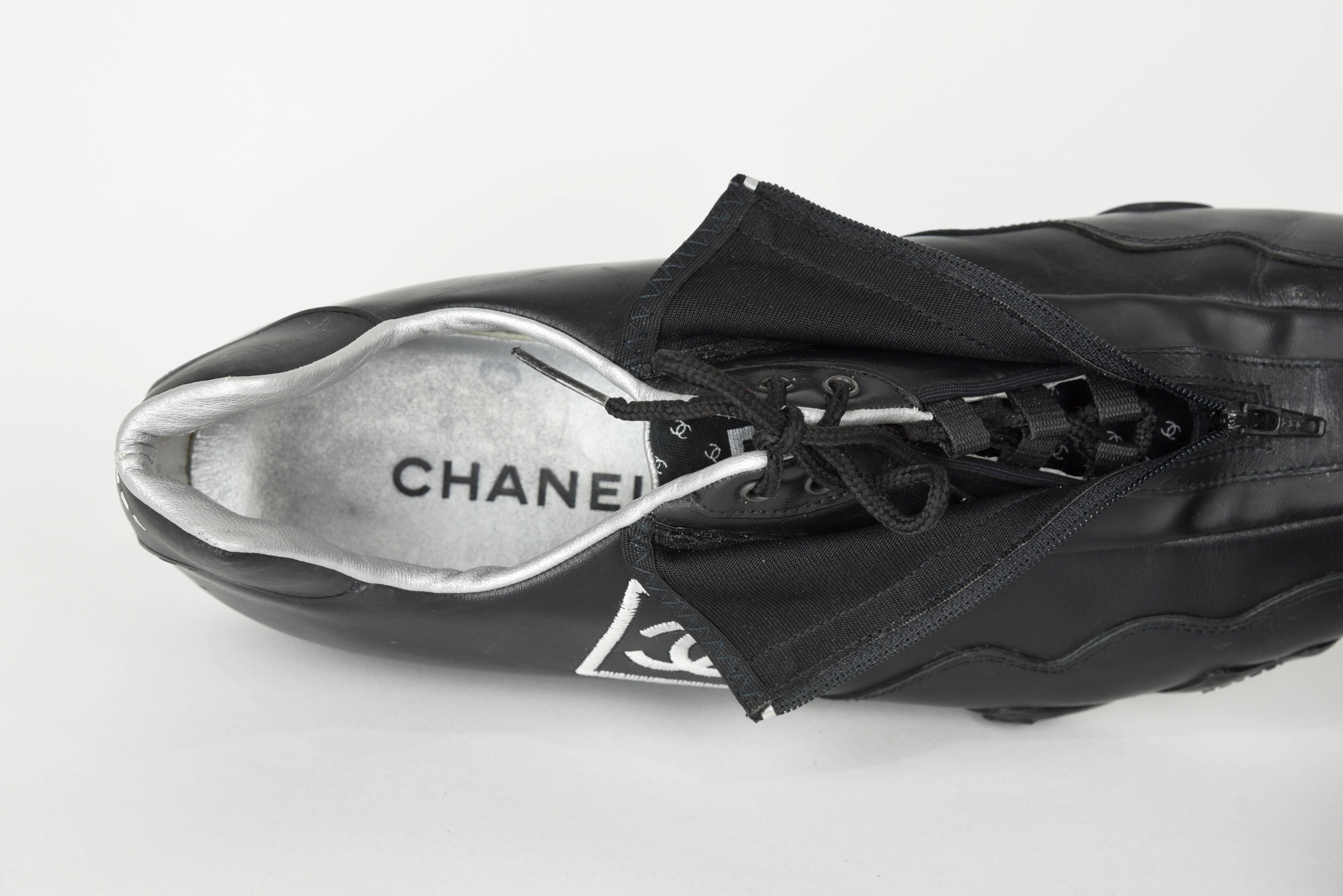 2000s Chanel Sleek Black Leather Athletic Shoes with Hidden Zipper  FR 41 5