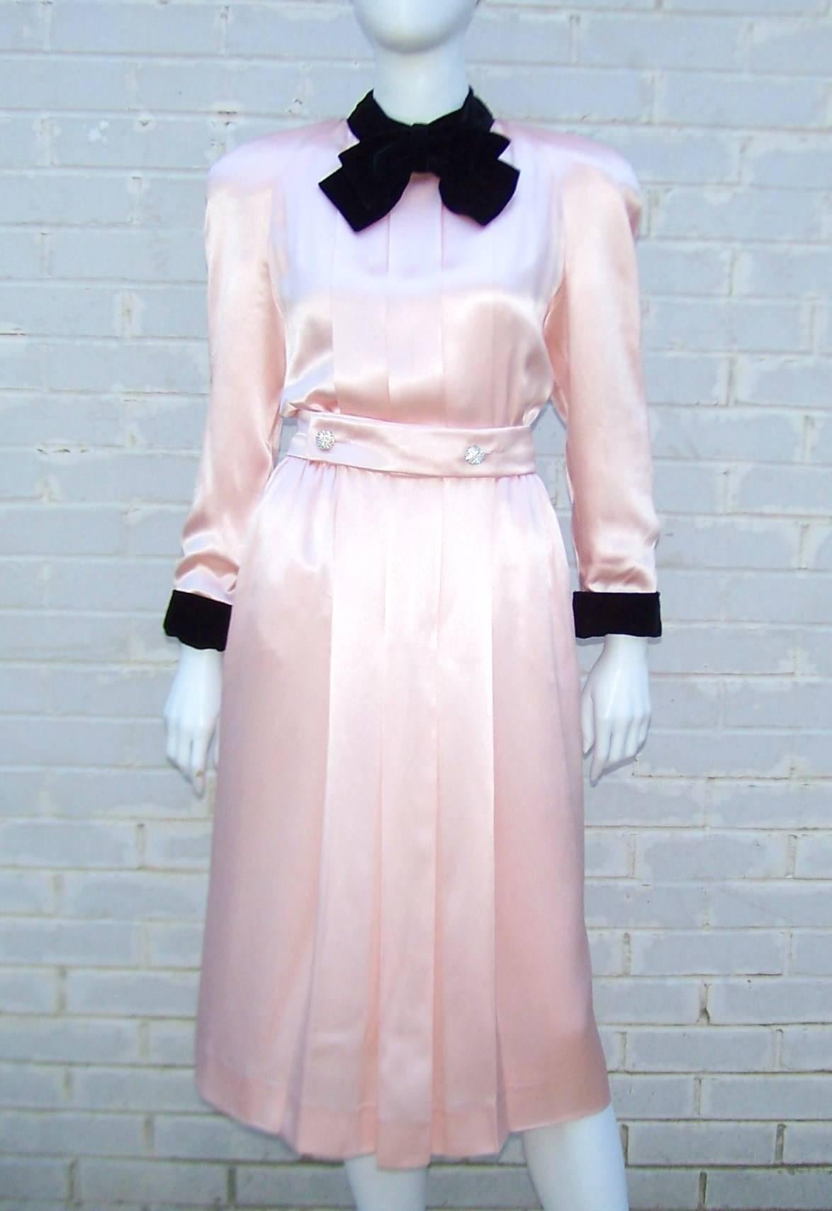 What a beauty!  Lovely example of Albert & Pearl Nipon's ability to create an elegant and yet comfortable dress with details galore.  The ballerina pink charmeuse fabric contrasts nicely with the black velvet collar and cuffs.  As if that