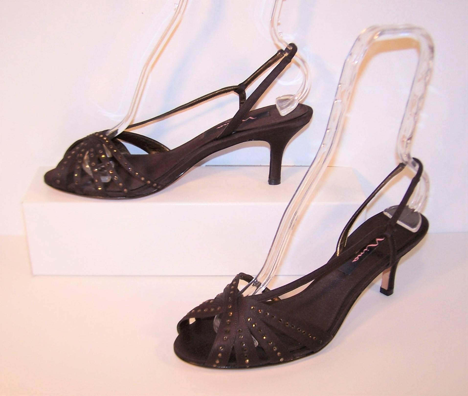 You can dance all night in these lovely chocolate brown satin fabric sandals by Nina of New York.  The elasticized slingback and modest 3" heel are reminiscent of 1950's styles.  The addition of coppery pave crystal embellishment on the
