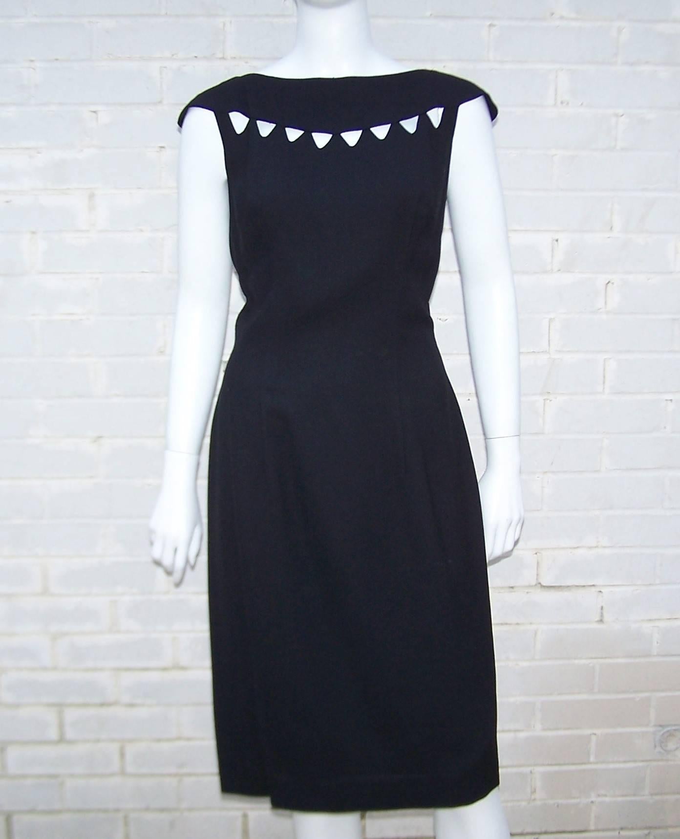 This Al Diamond design inspired by his glamorous wife, Lilli Diamond, is the summertime answer to the 'little black dress'.  The seemingly simple black linen wiggle dress is loaded with details making it anything but simple.  The sleeveless bodice