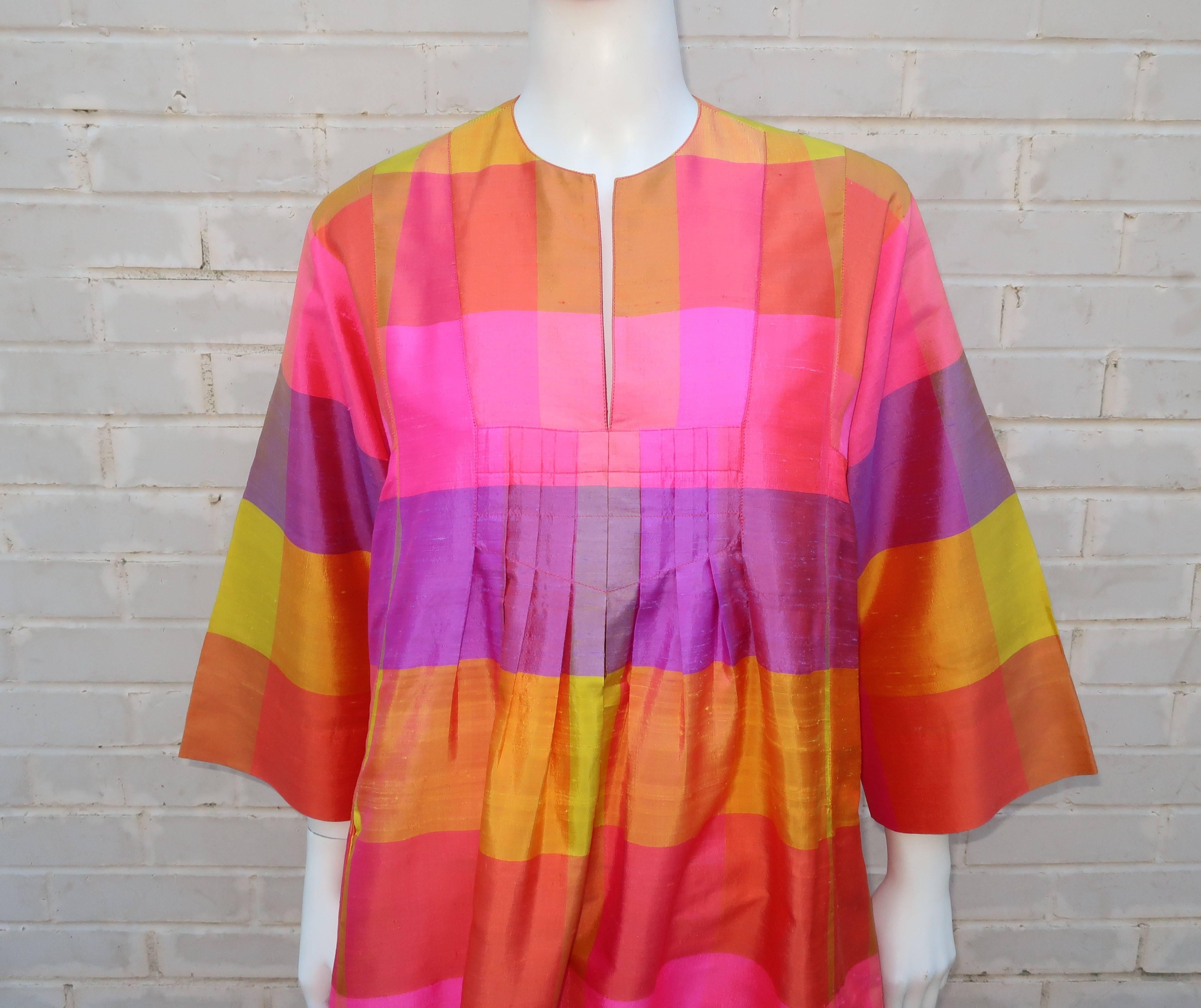 Take lounging to a whole new level with this Jim Thompson caftan made from hand woven Thai silk in rich exotic hues of hot pink, orange, purple, lilac and chartreuse.  Jim Thompson was an American art collector who dedicated himself to bringing the