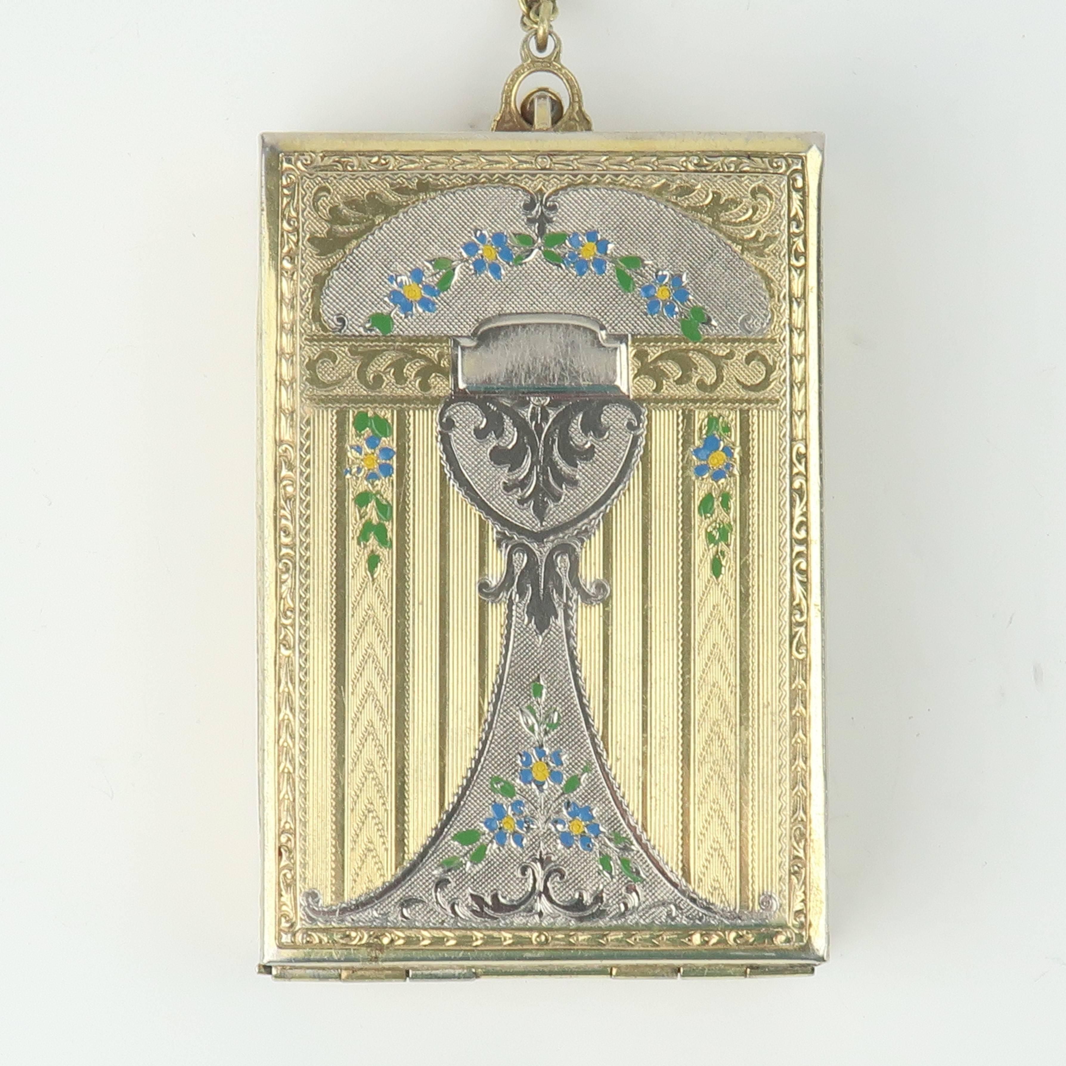 Much like chantelaines, elaborate mirrored compacts are feminine gadgets of a bygone era ... and oh so fun to explore!  This beautiful art nouveau example is a combination of gold and silver tone metals with guilloche decoration on the exterior and