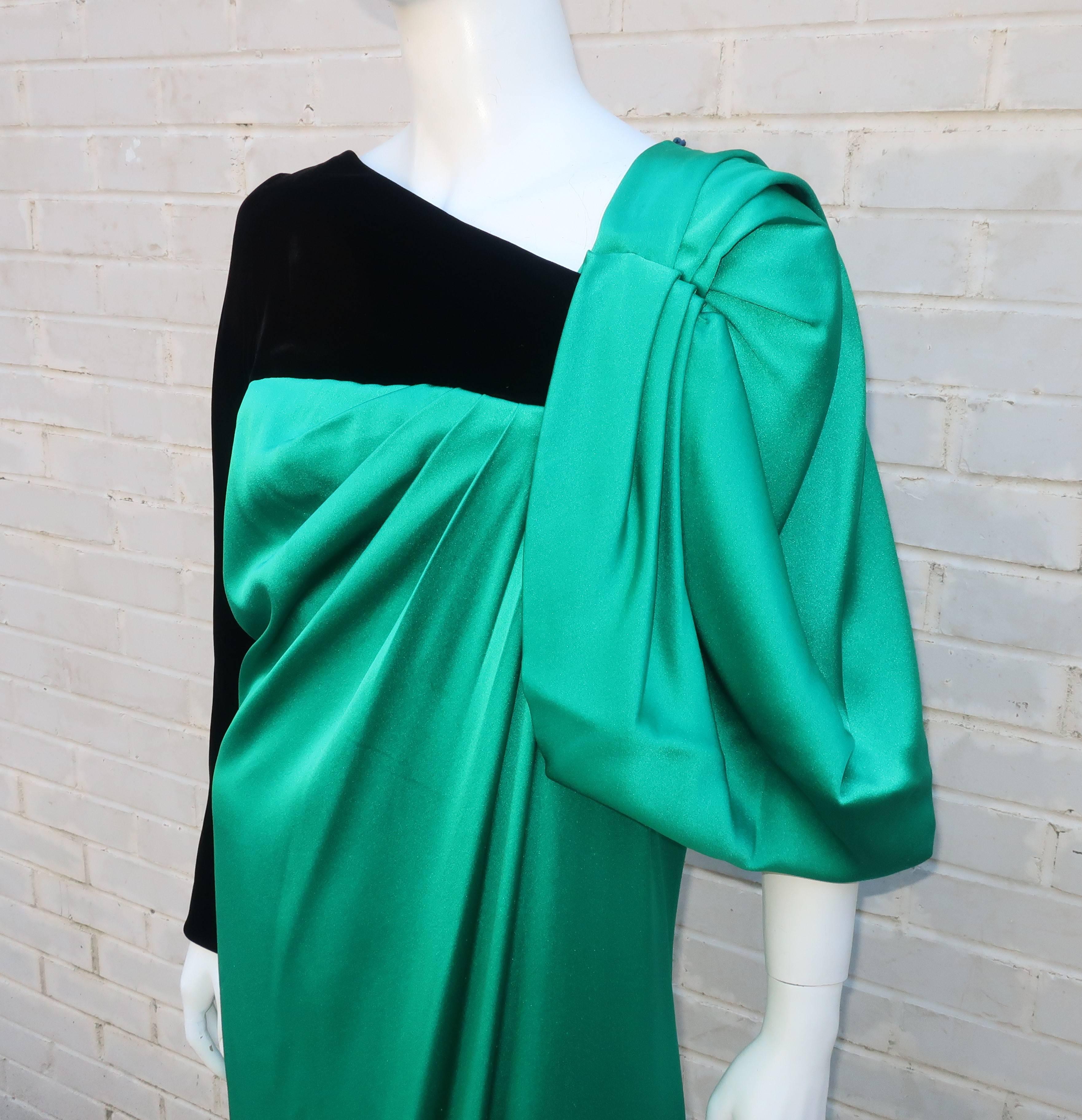 This 1980's evening gown is as stunning as its creator, Jacqueline de Ribes.  Comtesse de Ribes is as well known for her personal style and profile as she is for her fashion designs which all reflect poise, elegance and beauty.  The dress is draped