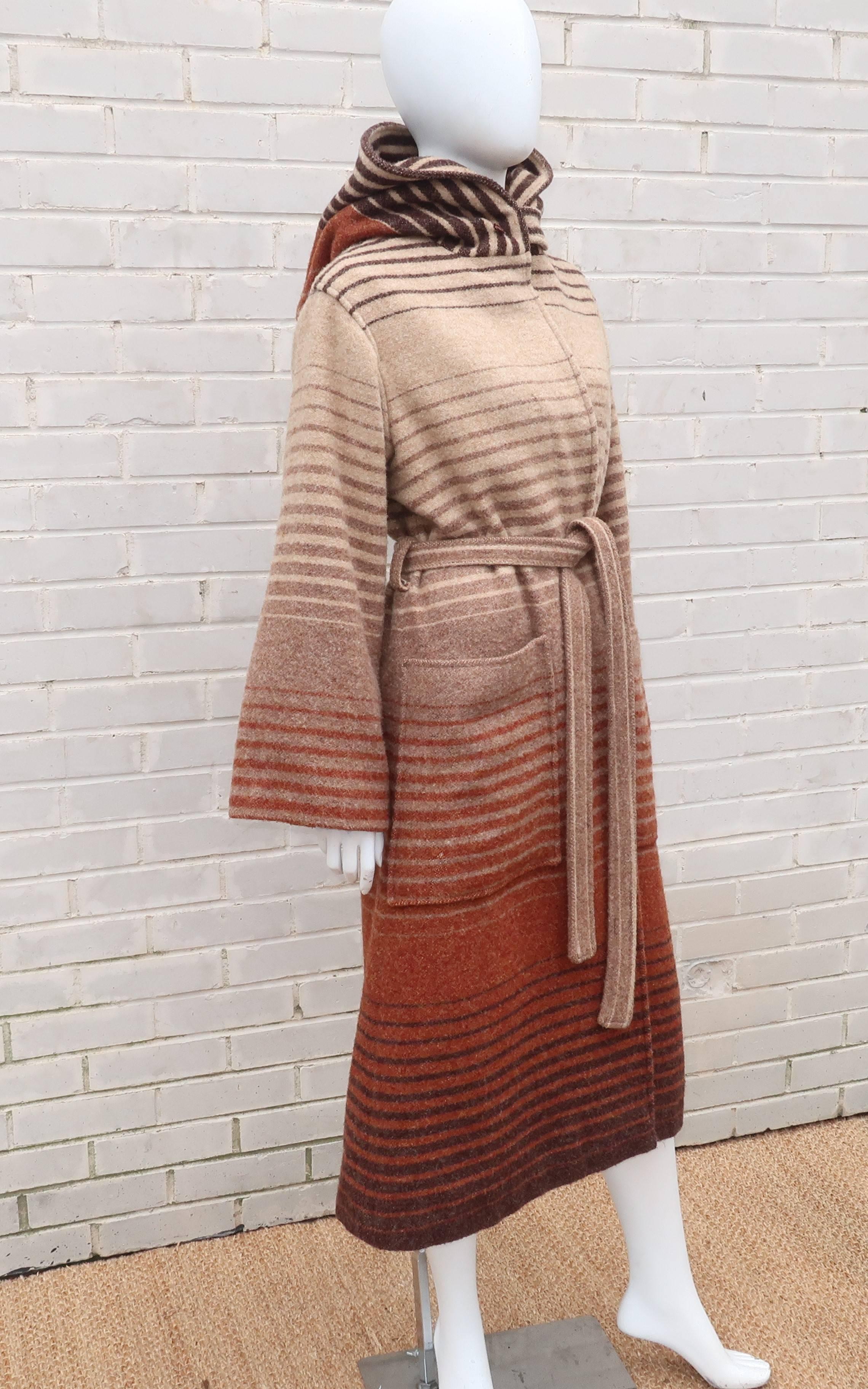There is something decidedly Obi-Wan Kenobi about this 1970’s Luba coat.  Star Wars may not have been the inspiration but the cloak style silhouette, including the hood, sash belt and bell sleeves, certainly lend themselves to the fashion of an era