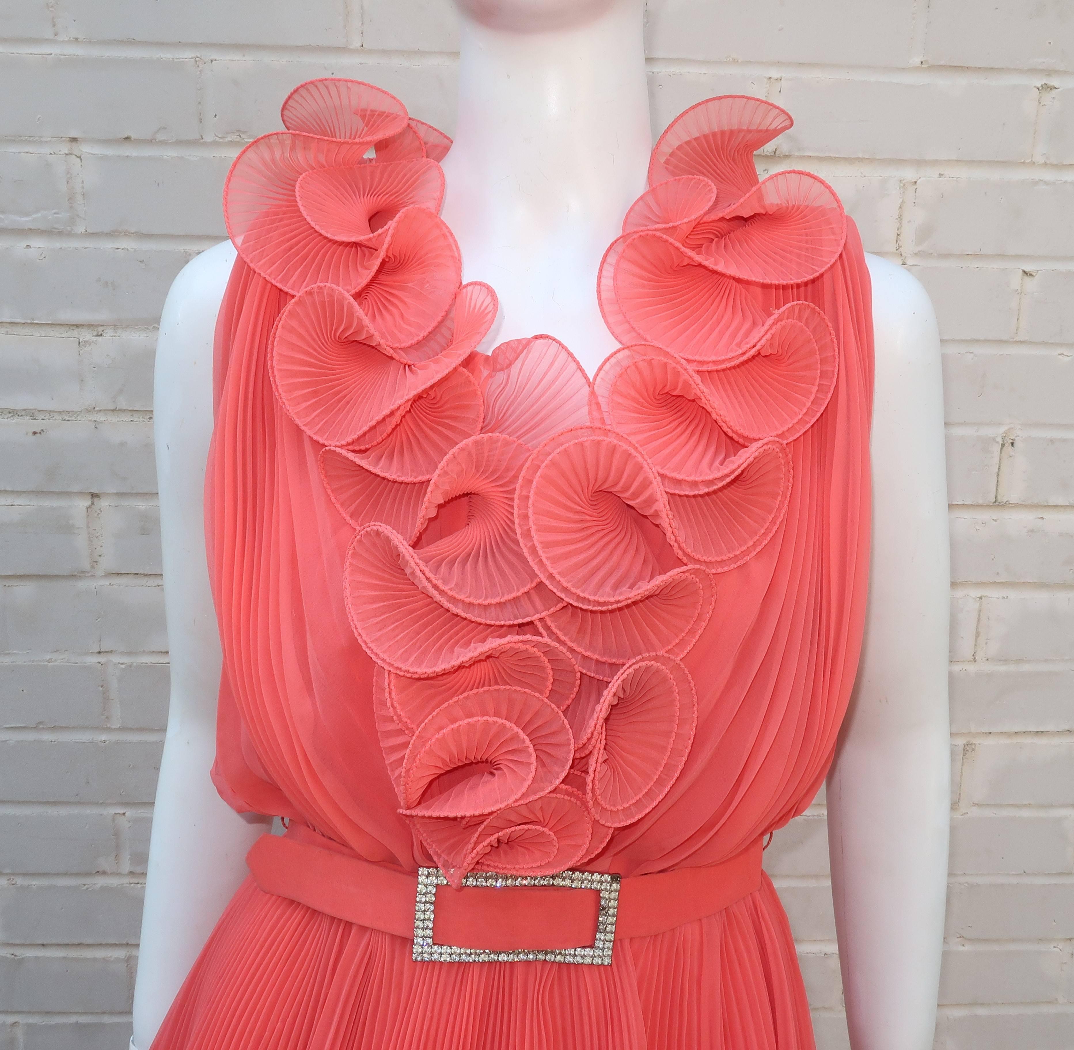 This Jack Bryan of California design is the 1960's version of a goddess dress and perfectly divine!  The coral color sheer georgette chiffon is micro pleated throughout with an elaborate ruffled collar stiffened with filament to create quite a