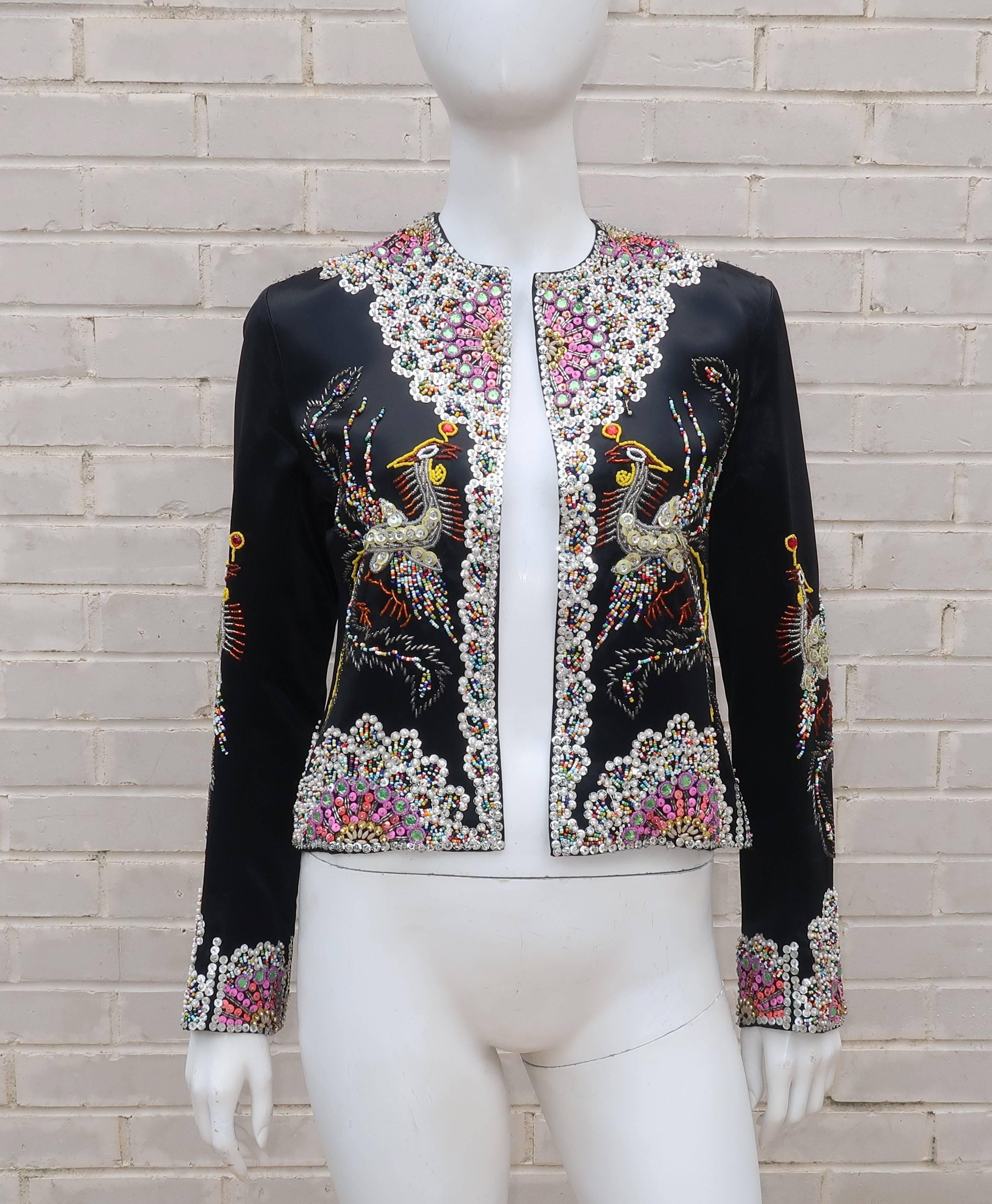 The party has arrived!  This colorful evening jacket is reminiscent of folkloric beading from the Latin Americas though it was designed under the Dynasty label which created Asian inspired silhouettes for the American market.  The fabulous mix of